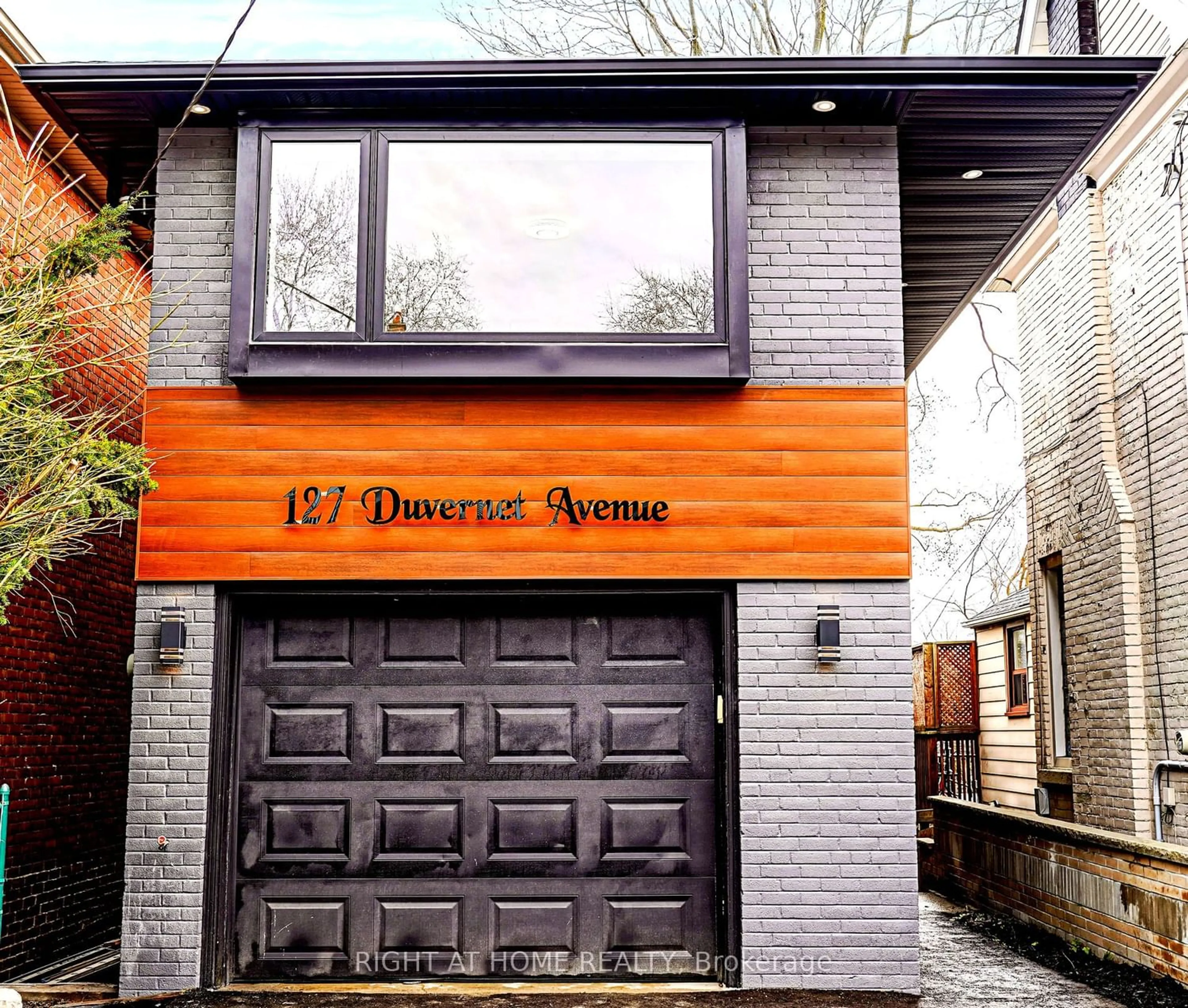 Home with brick exterior material for 127 Duvernet Ave, Toronto Ontario M4E 1V5