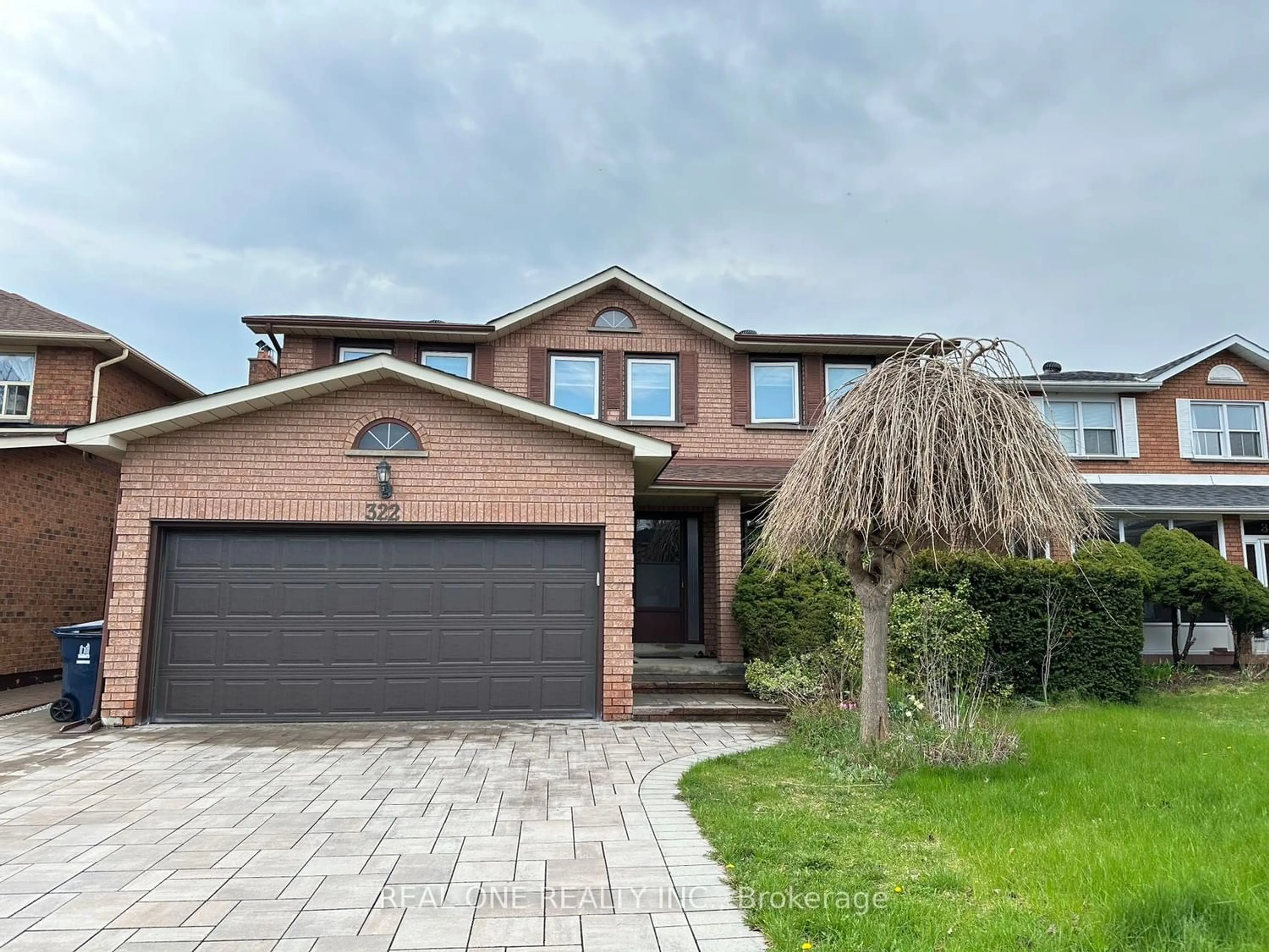 Frontside or backside of a home for 322 Goldhawk Tr, Toronto Ontario M1V 4H1