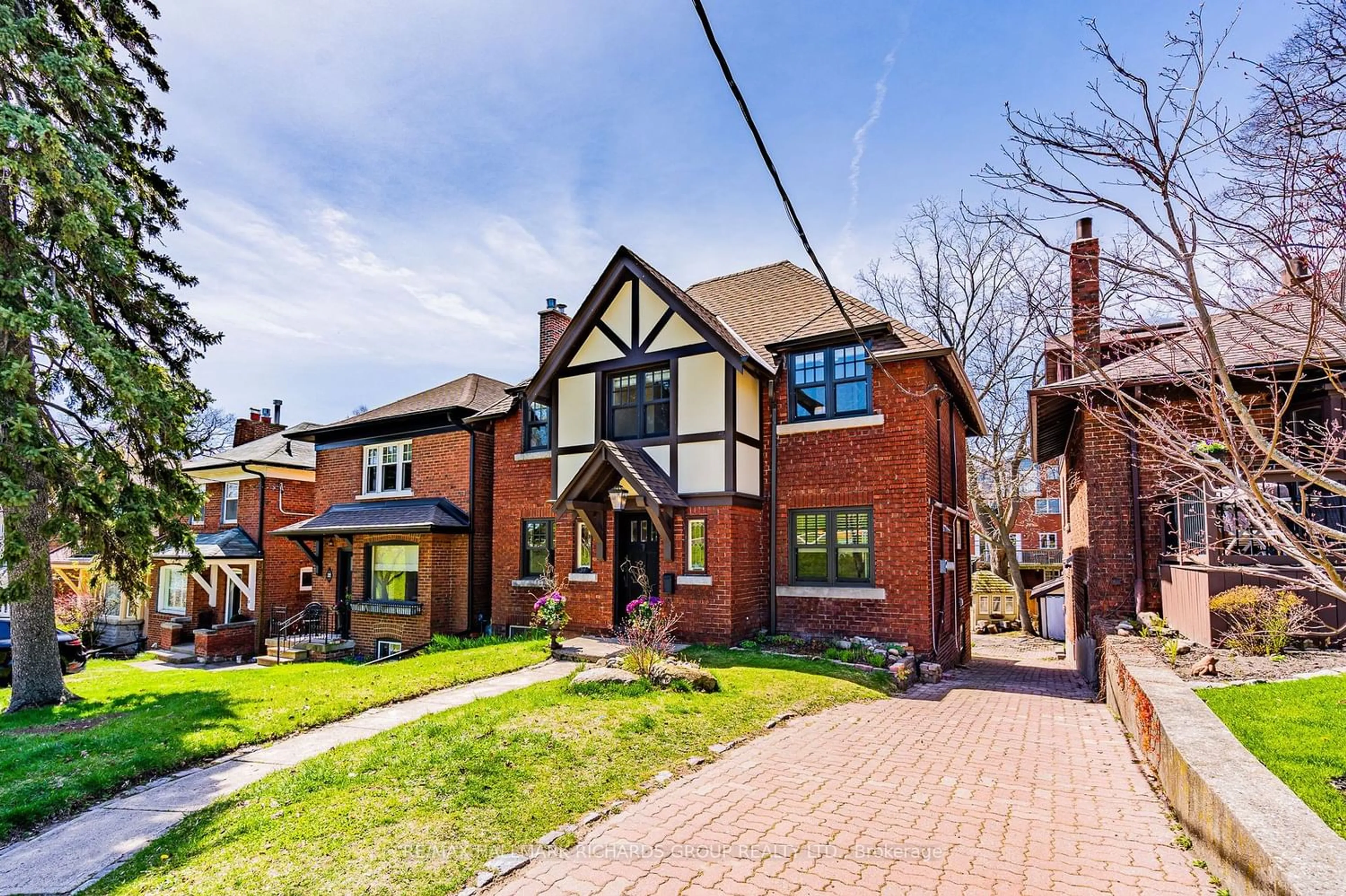 Home with brick exterior material for 34 Nursewood Rd, Toronto Ontario M4E 3R8