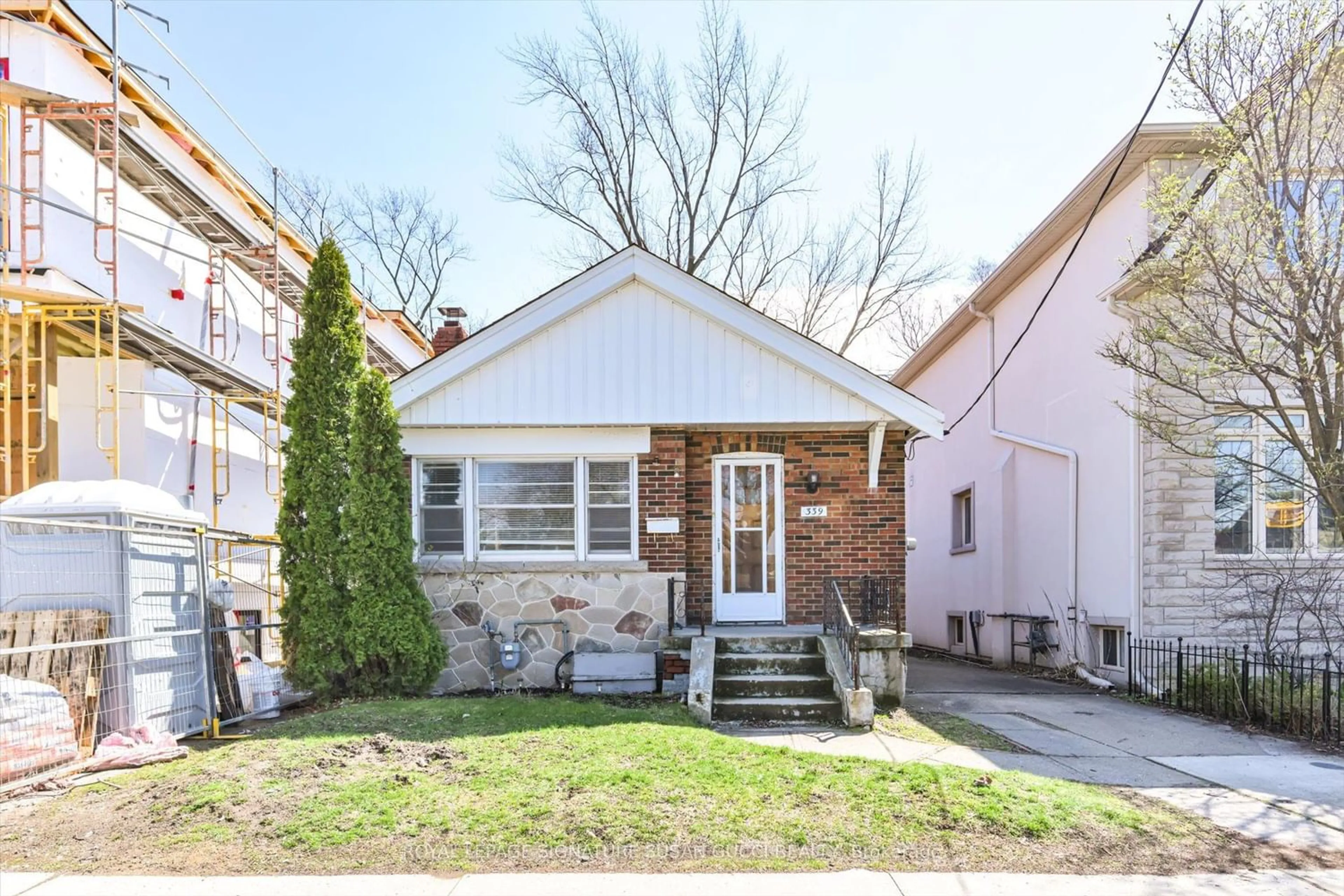 Frontside or backside of a home for 339 Cosburn Ave, Toronto Ontario M4J 2N2