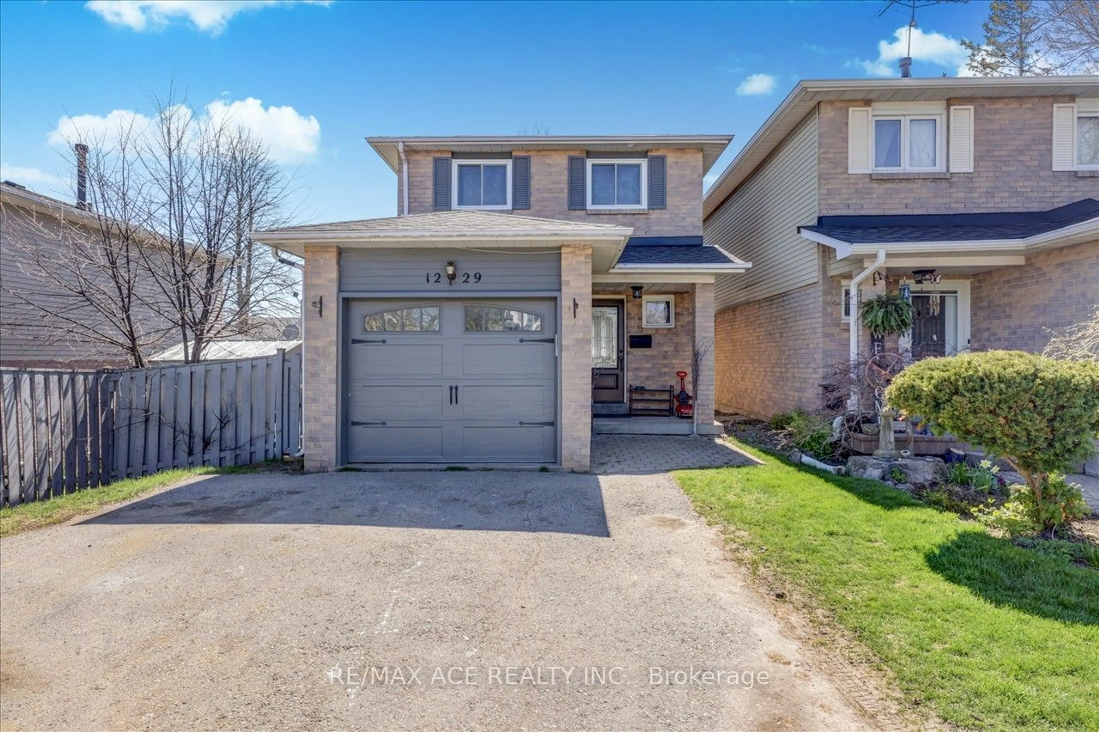 Frontside or backside of a home for 1229 Delmark Crt, Oshawa Ontario L1H 8K6