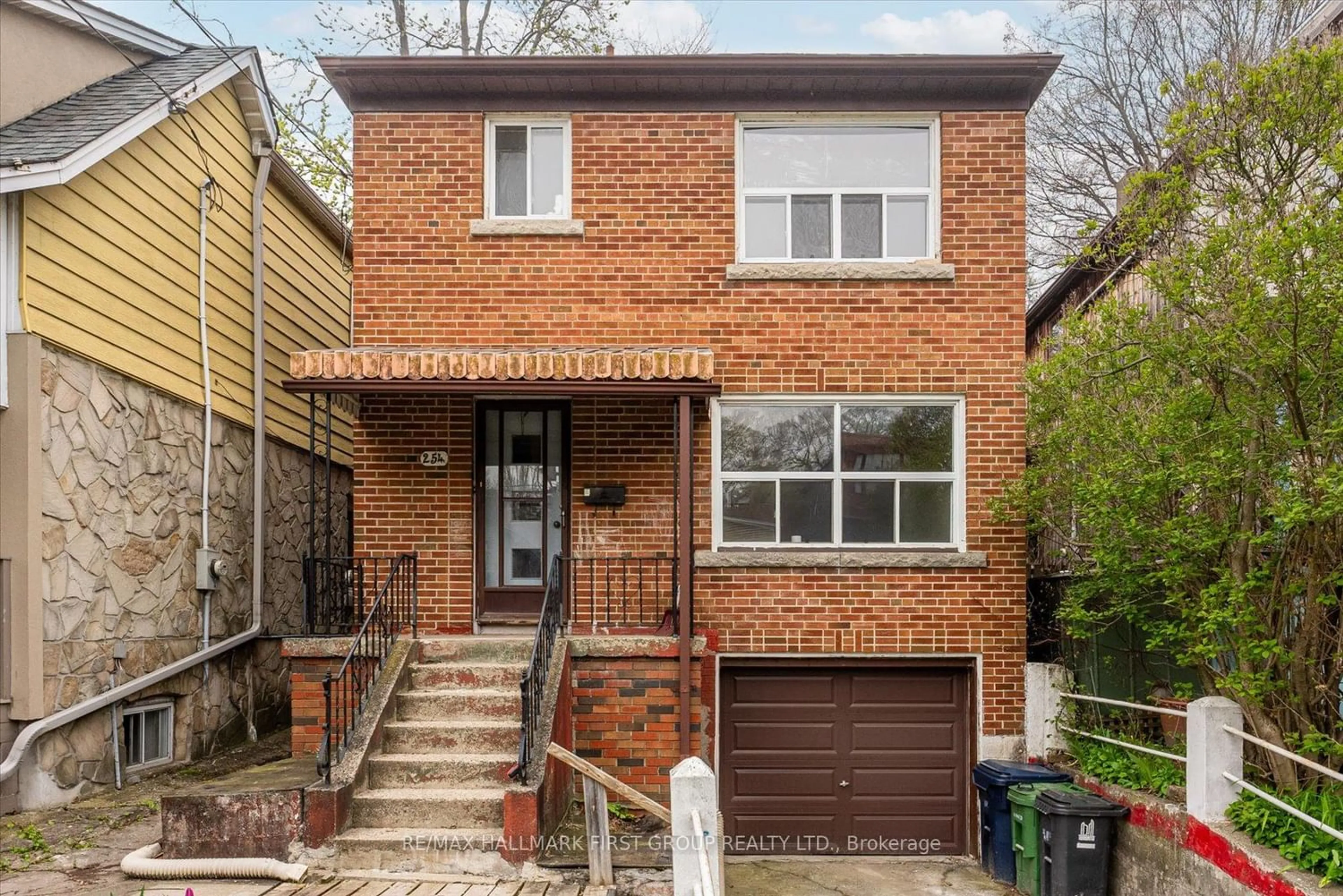 Home with brick exterior material for 254 Hastings Ave, Toronto Ontario M4L 2M1