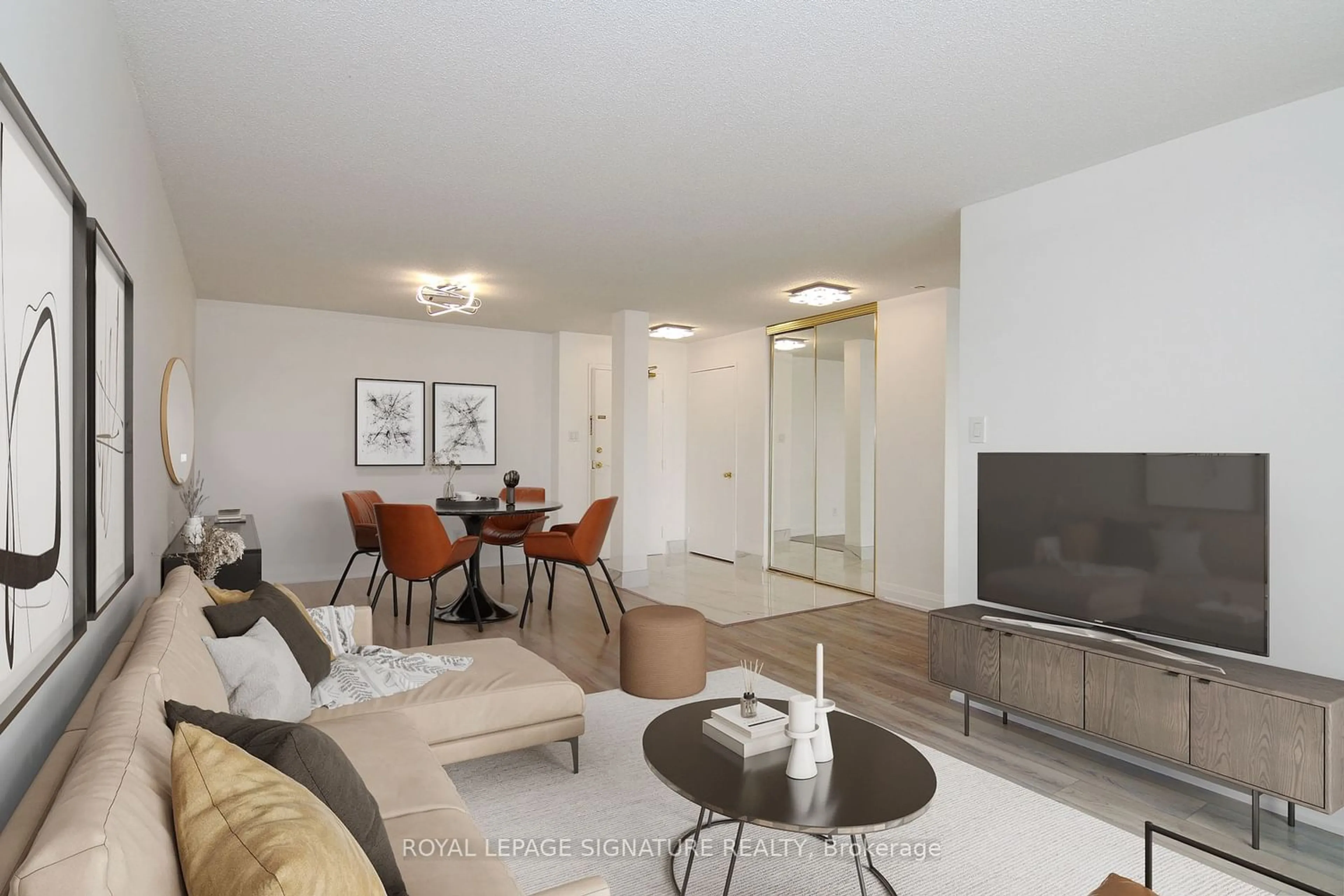 Living room for 11753 Sheppard Ave #709, Toronto Ontario M1B 5M3