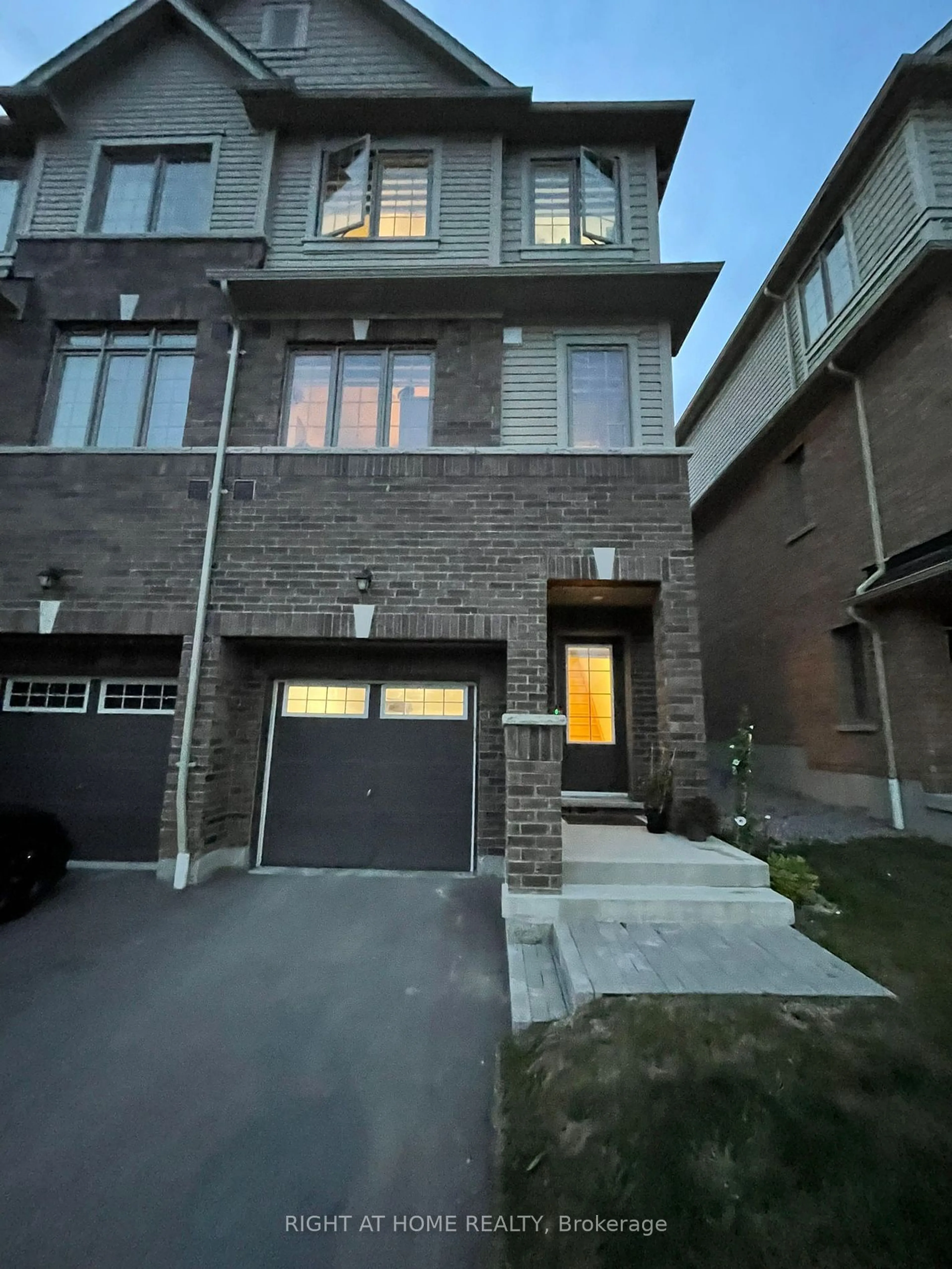 A pic from exterior of the house or condo for 219 Danzatore Path, Oshawa Ontario L1L 0P9