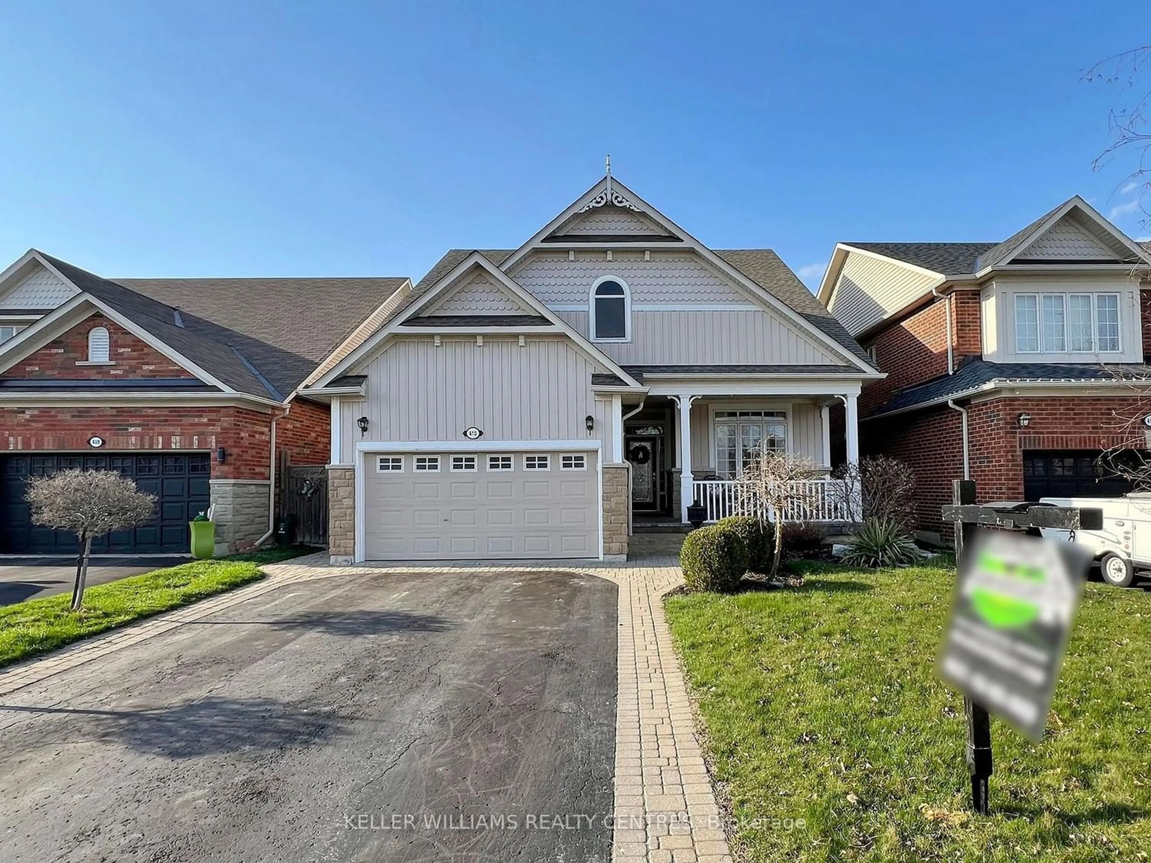Frontside or backside of a home for 410 Carnwith Dr, Whitby Ontario L1M 0A8