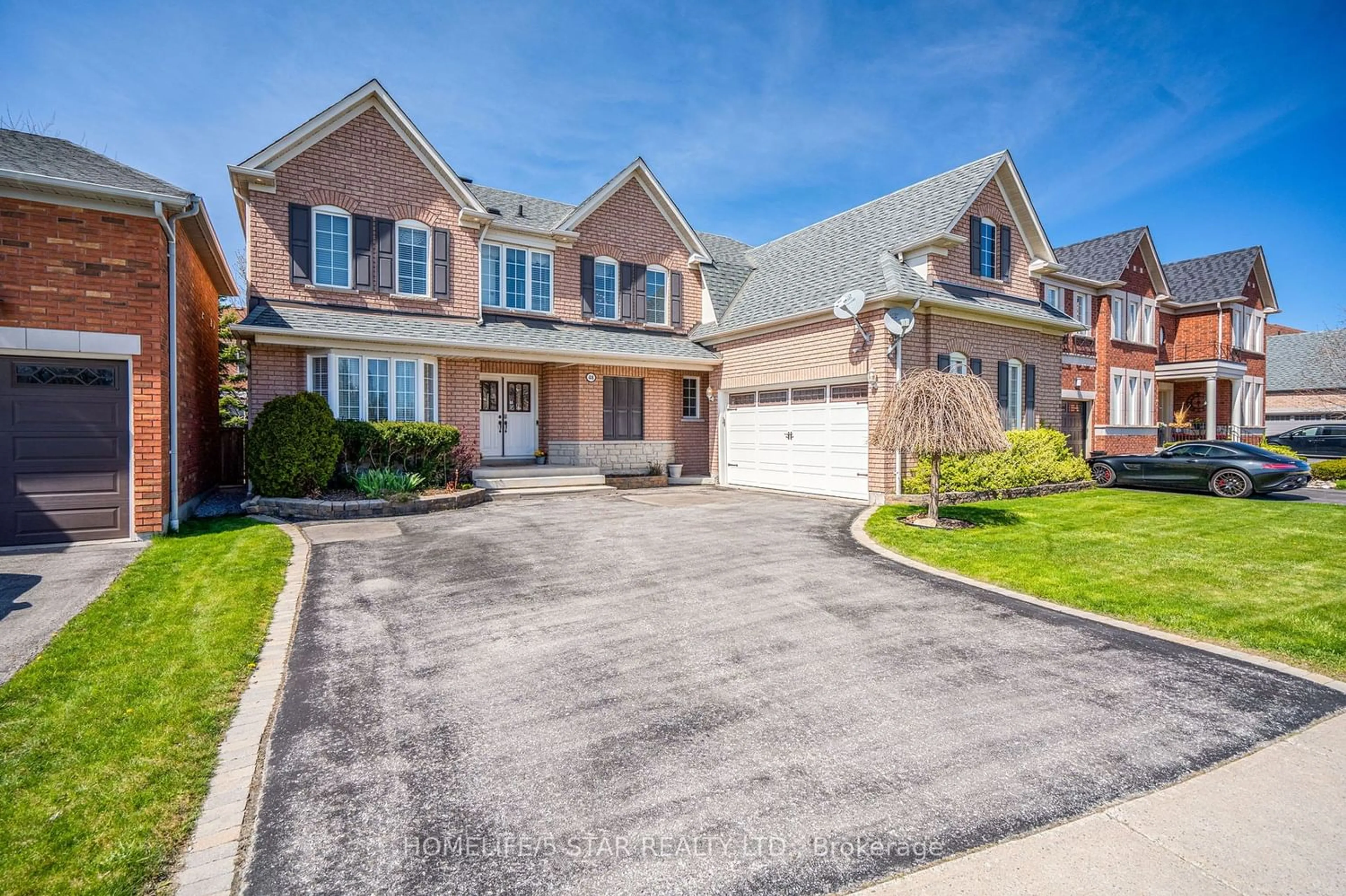Frontside or backside of a home for 48 Williamson Dr, Ajax Ontario L1T 4M9