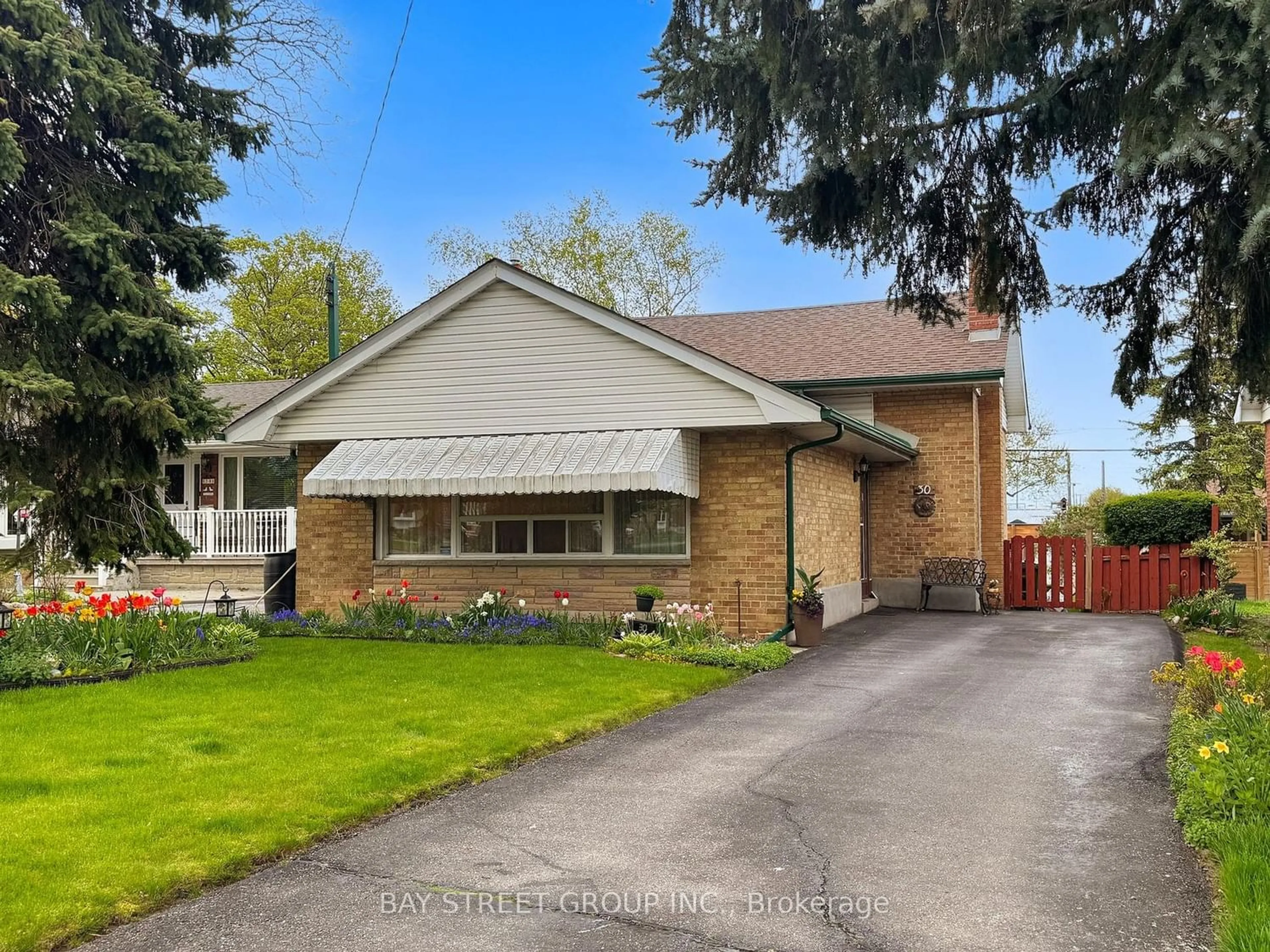 Frontside or backside of a home for 30 Mendip Cres, Toronto Ontario M1P 1Y4