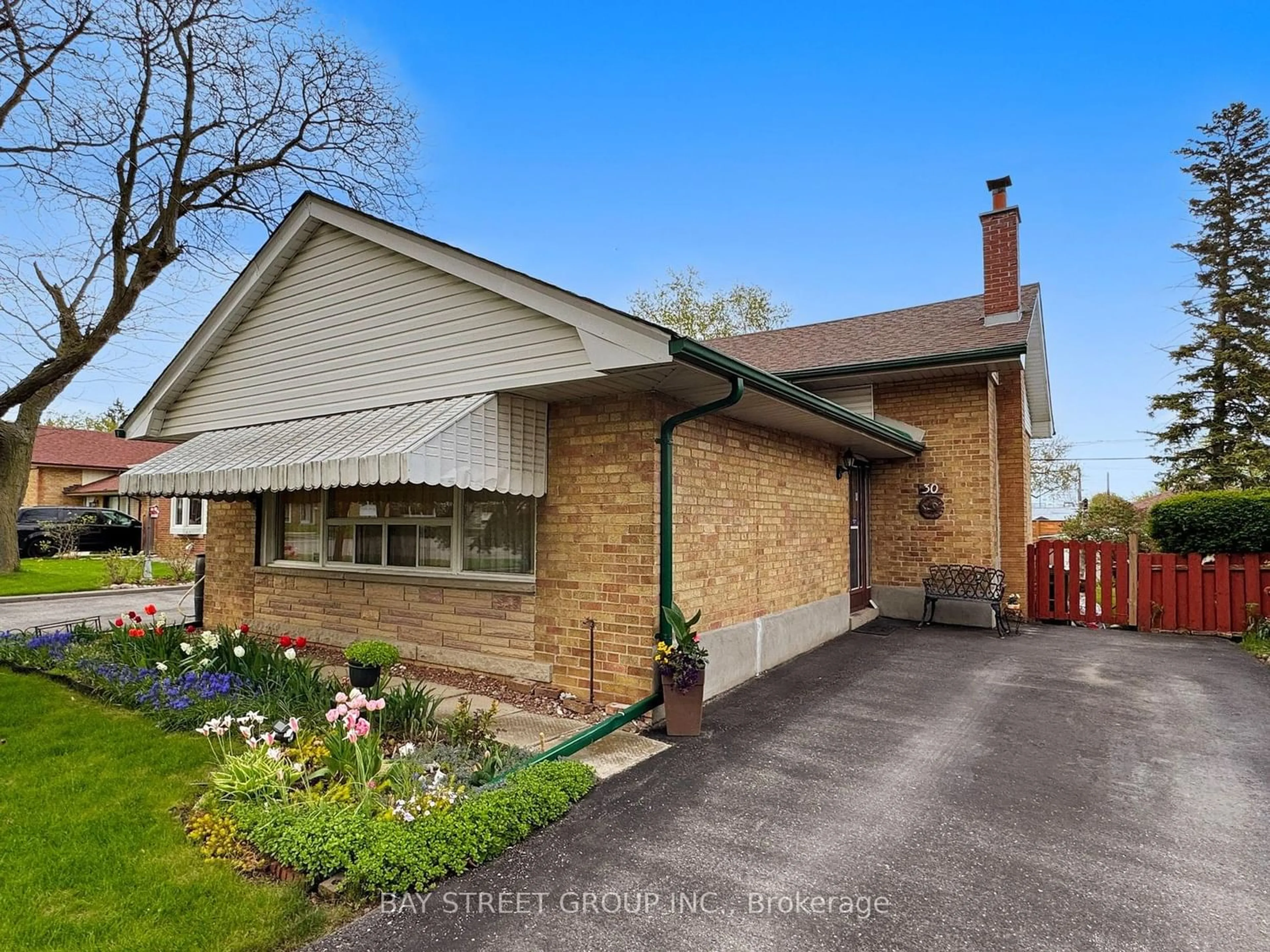 Frontside or backside of a home for 30 Mendip Cres, Toronto Ontario M1P 1Y4