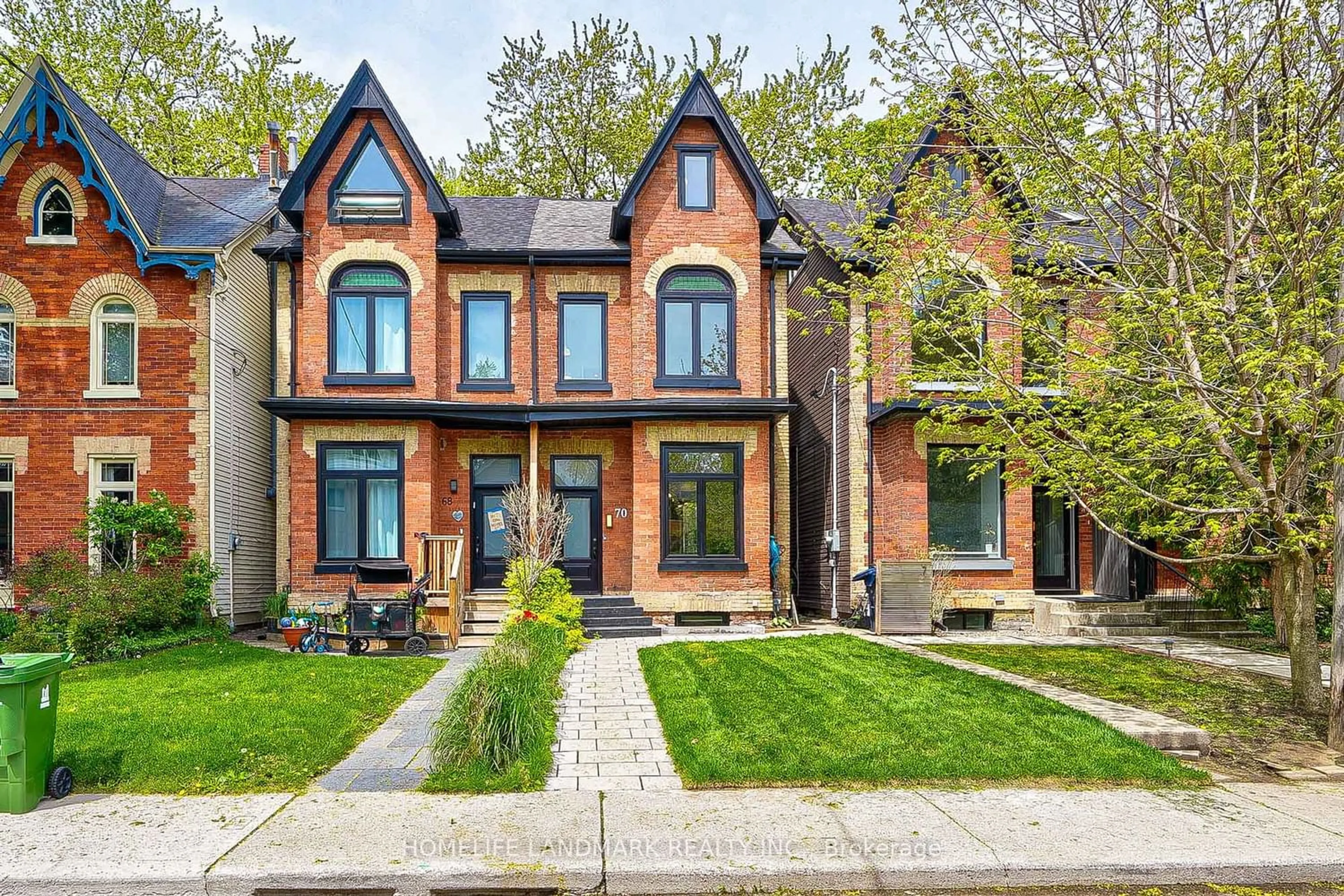 Home with brick exterior material for 70 Badgerow Ave, Toronto Ontario M4M 1V4