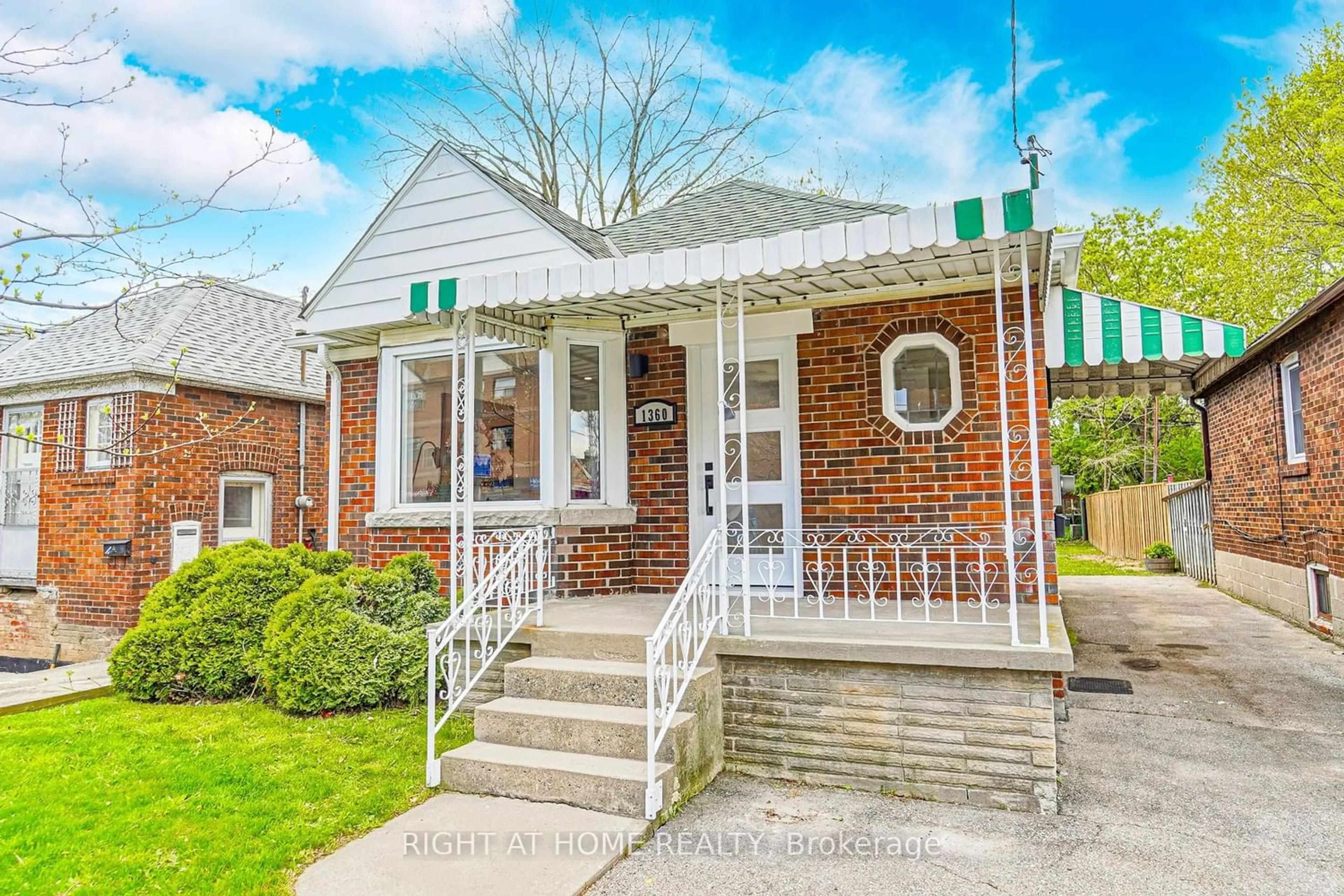 Home with brick exterior material for 1360 Woodbine Ave, Toronto Ontario M4C 4G5