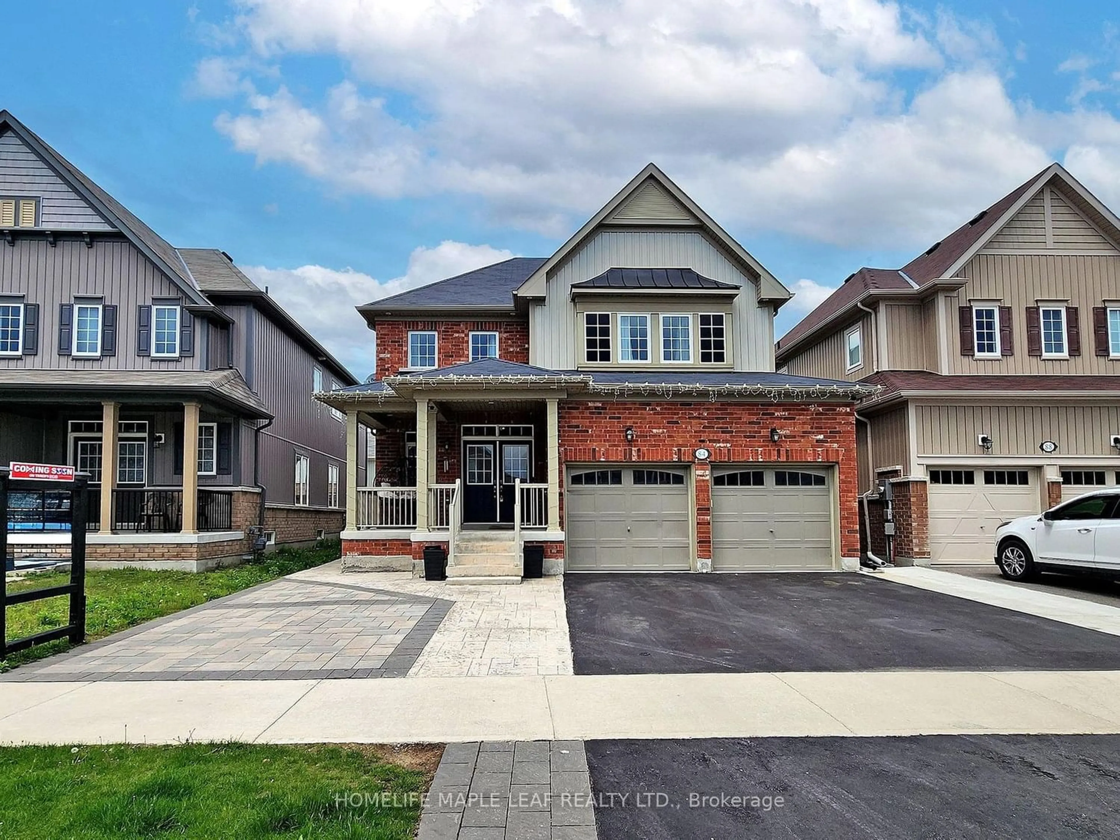 Frontside or backside of a home for 84 William Fair Dr, Clarington Ontario L1C 0T2