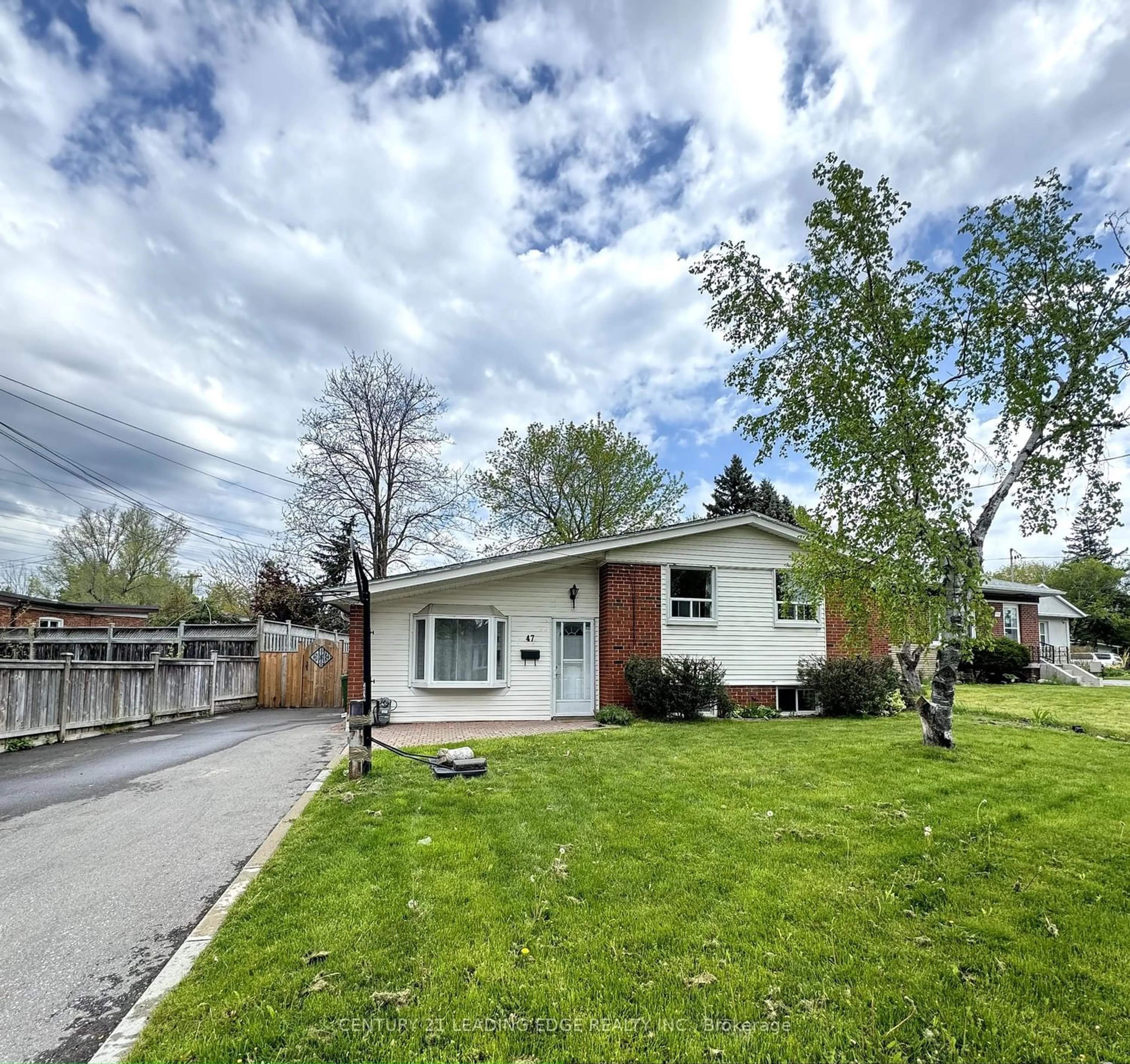Frontside or backside of a home for 47 Benlight Cres, Toronto Ontario M1H 1P4