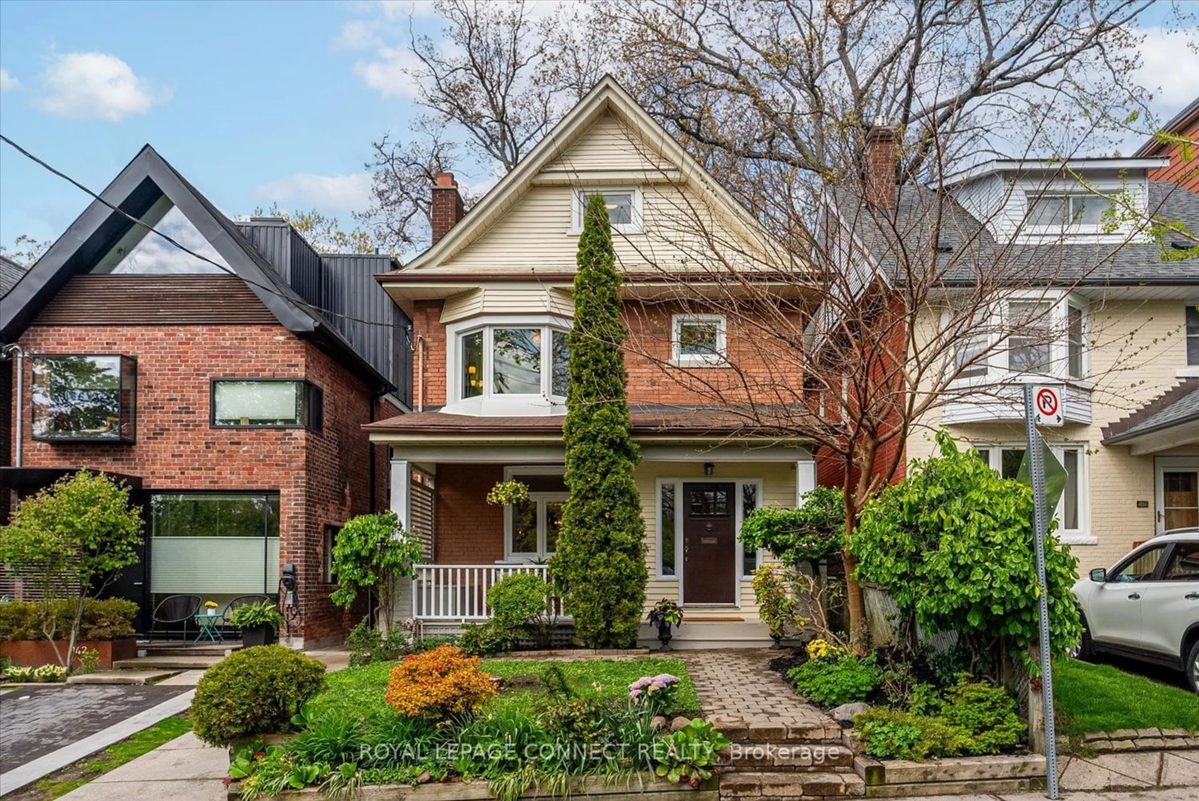 Home with brick exterior material for 144 Kenilworth Ave, Toronto Ontario M4L 3S6
