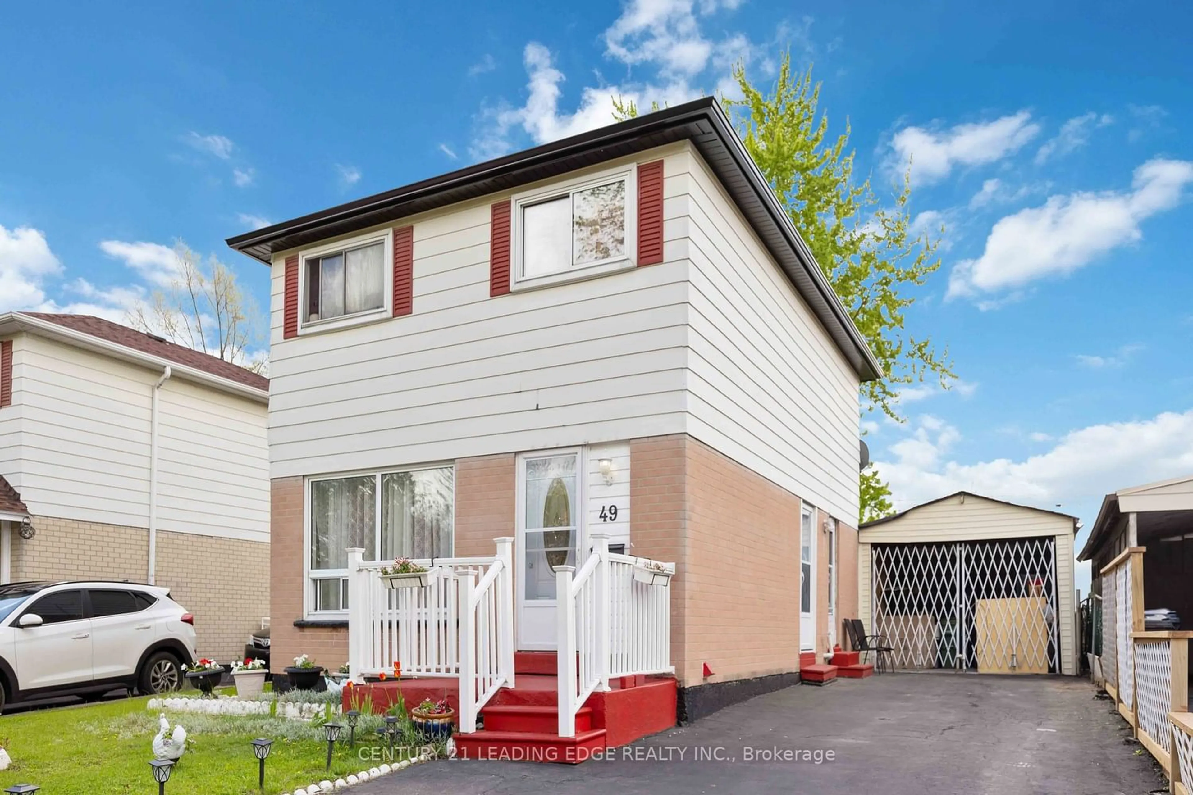 Frontside or backside of a home for 49 Dowswell Dr, Toronto Ontario M1B 1H5