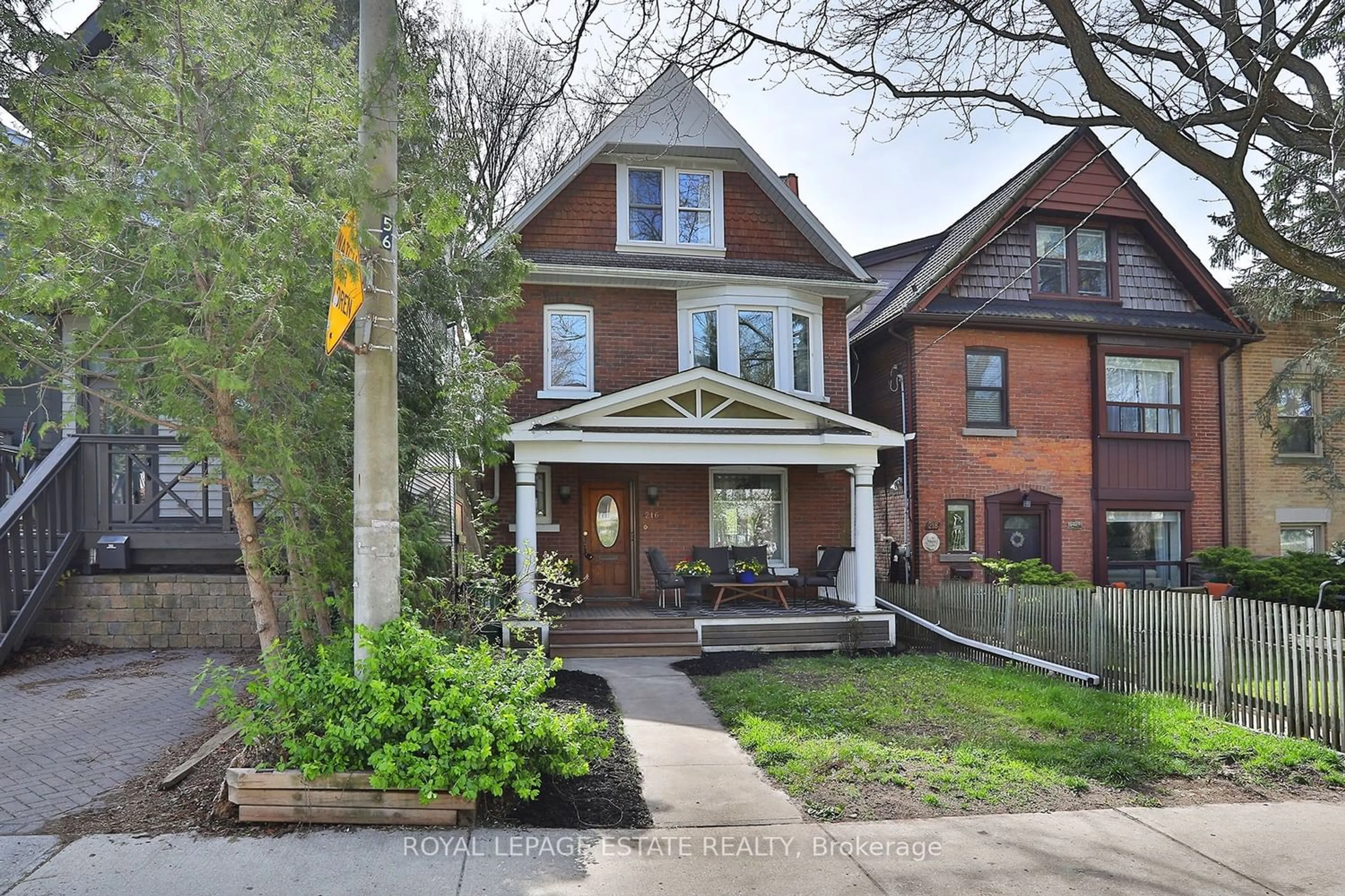 Home with brick exterior material for 216 Waverley Rd, Toronto Ontario M4L 3T3