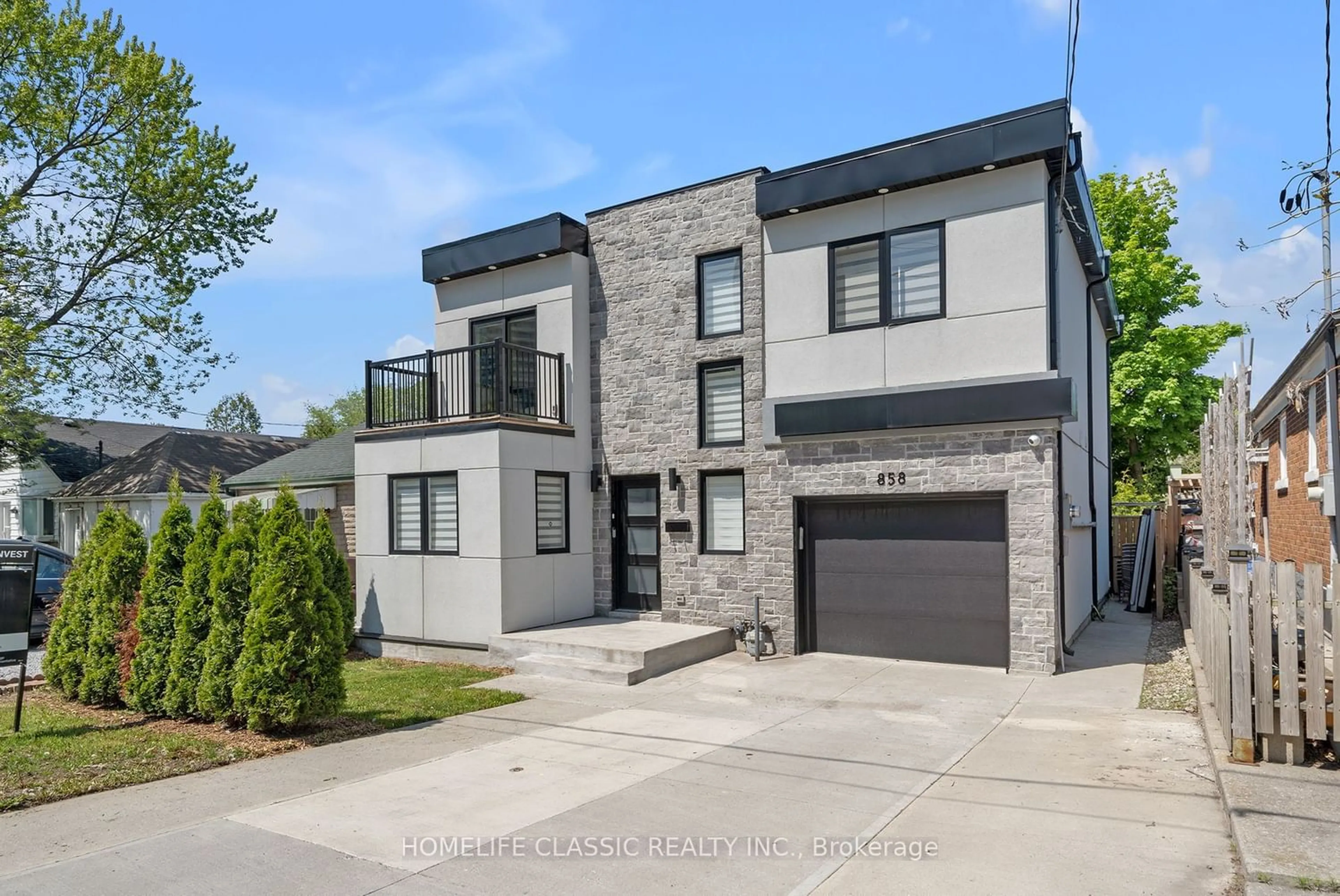 Home with brick exterior material for 858 Danforth Rd, Toronto Ontario M1K 1H5