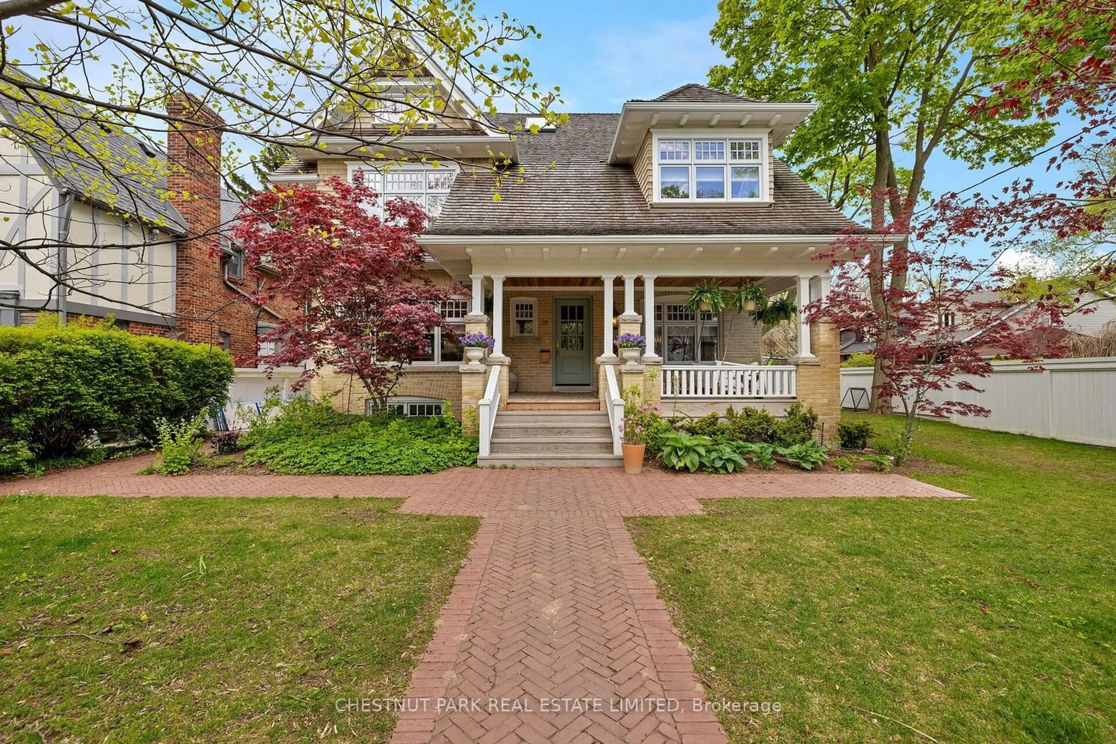 Home with brick exterior material for 28 Bracken Ave, Toronto Ontario M4E 1N3