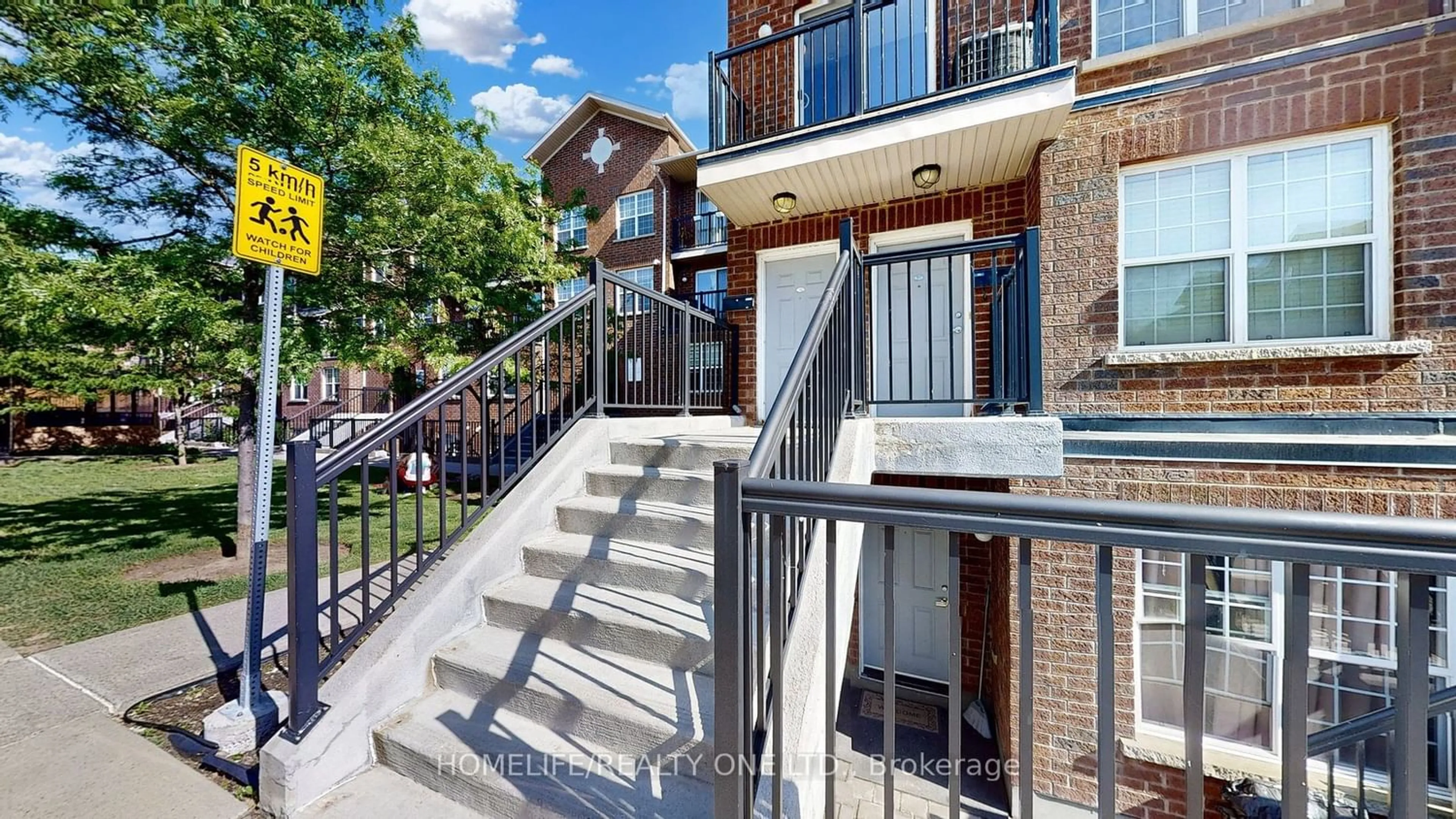 A pic from exterior of the house or condo for 35 Strangford Lane #311, Toronto Ontario M1L 0E5