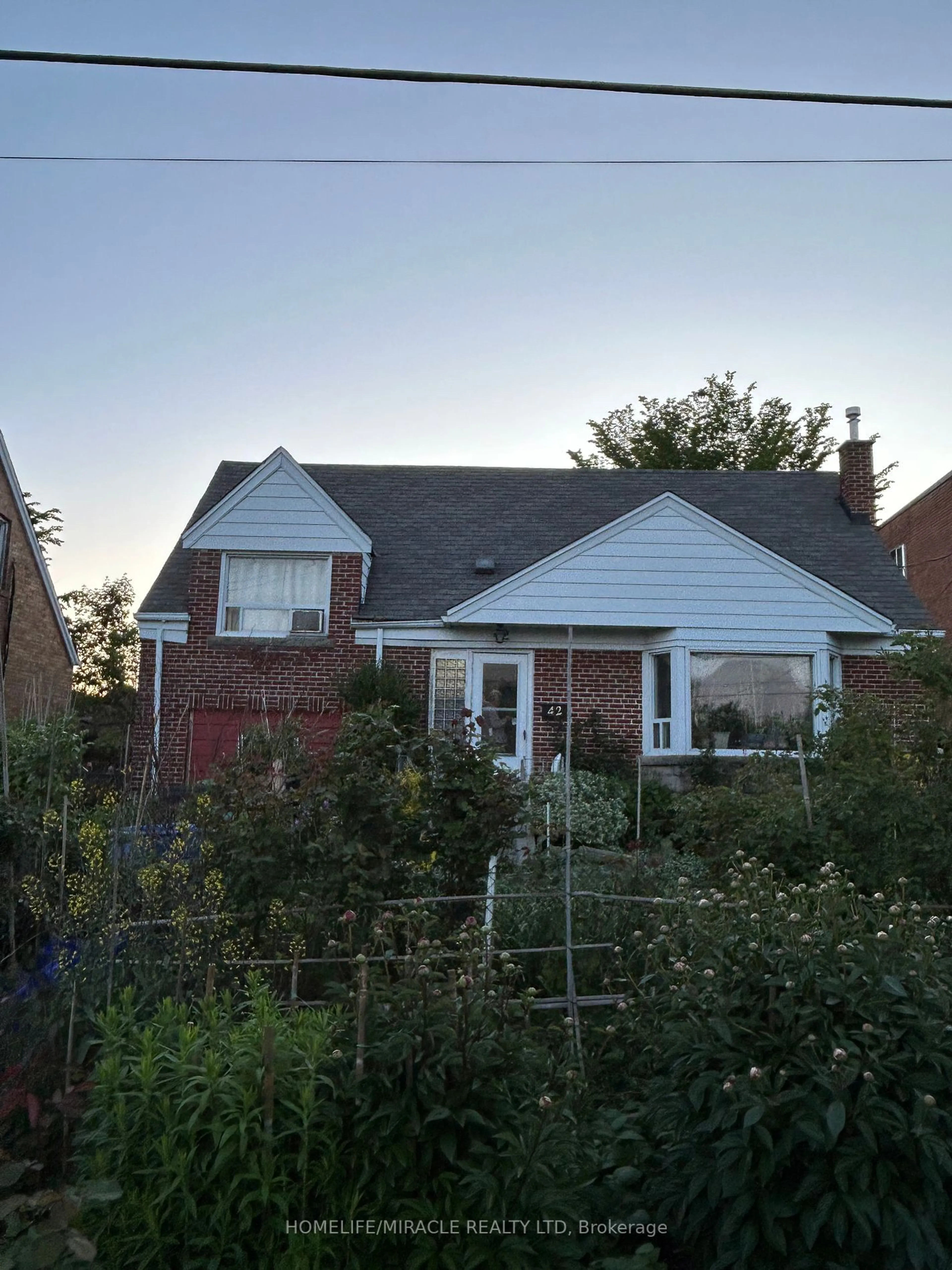 Frontside or backside of a home for 42 Glen Everest Rd, Toronto Ontario M1N 1J3