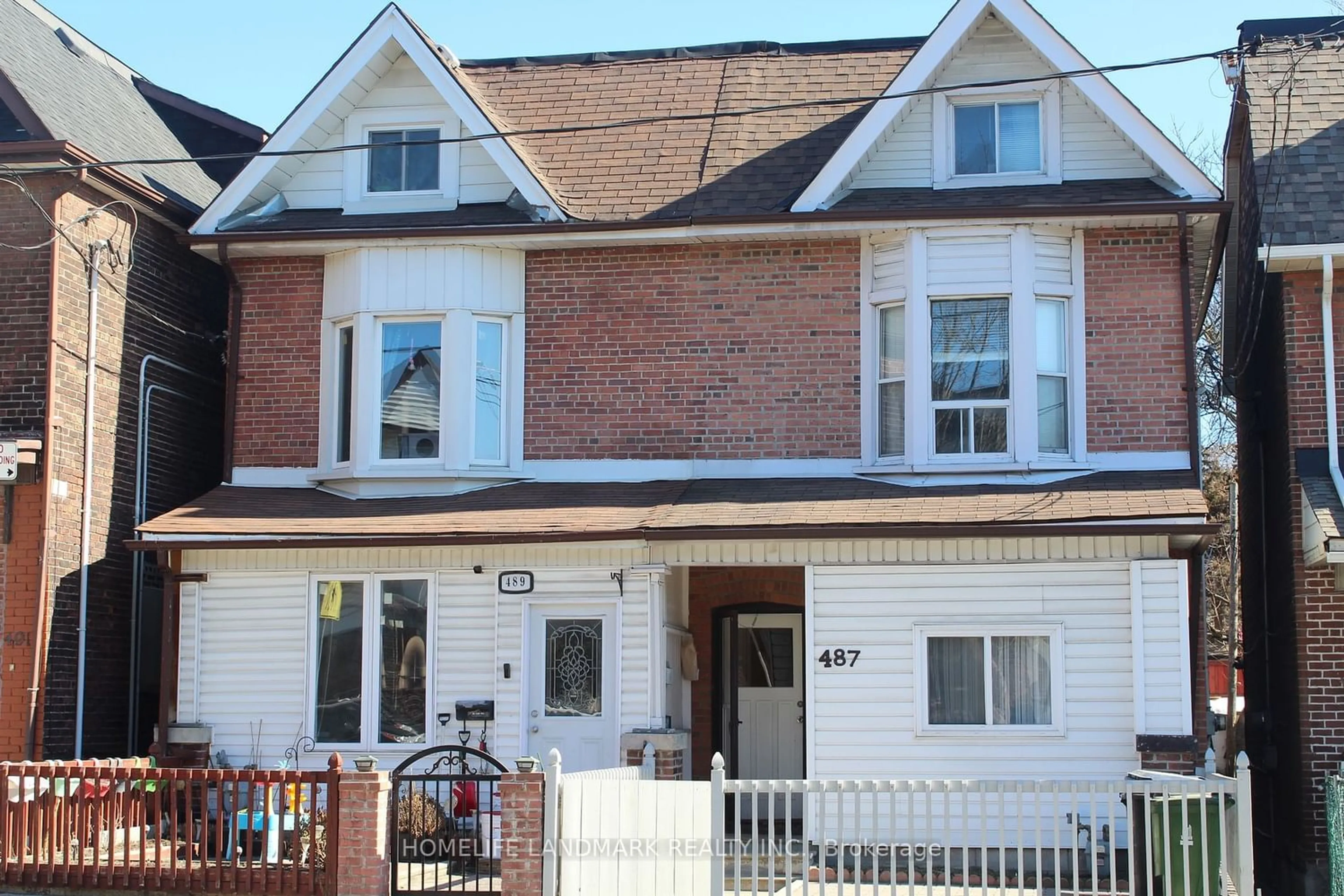Home with brick exterior material for 487 Carlaw Ave, Toronto Ontario M4K 3H9