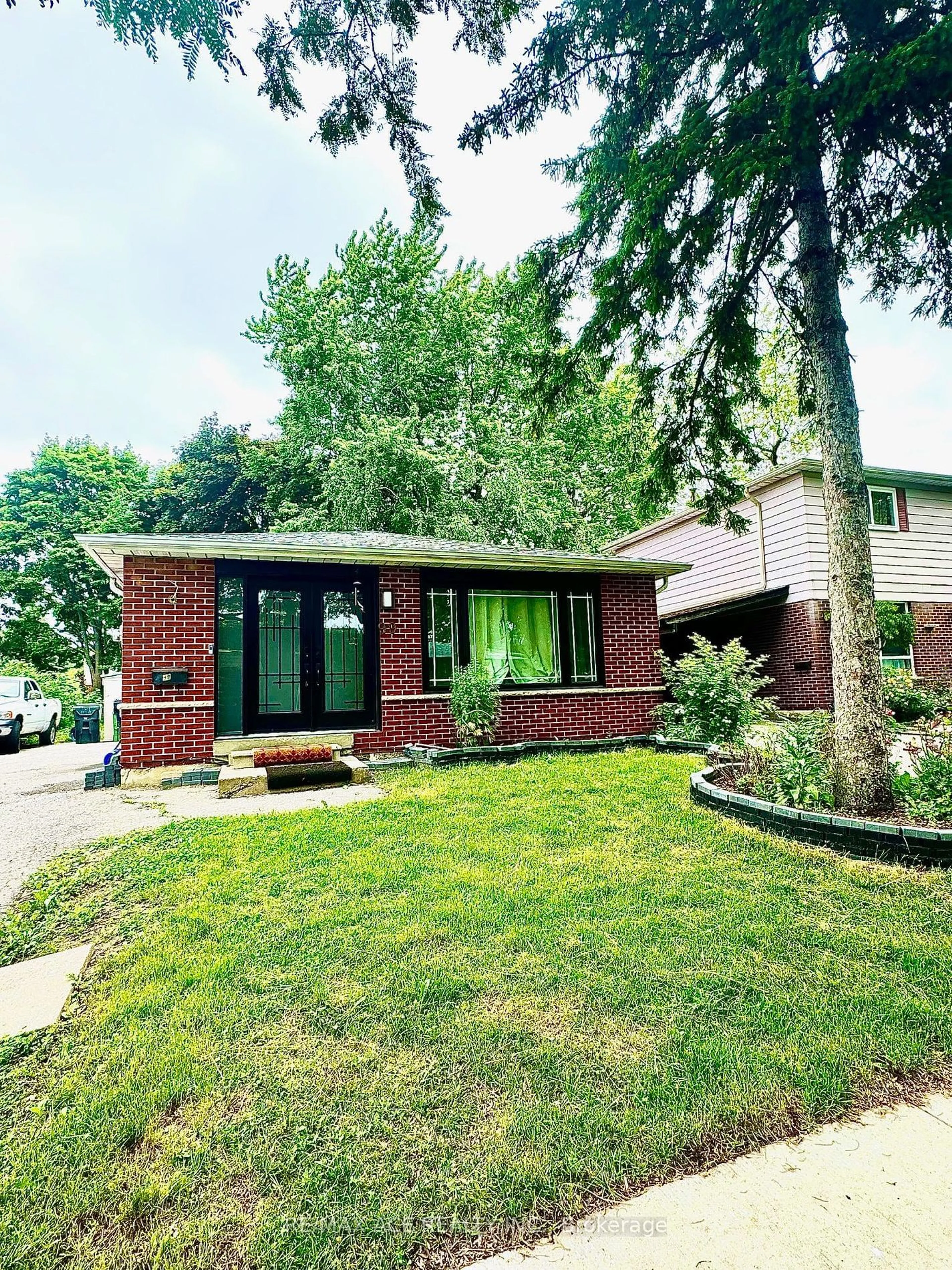 Home with brick exterior material for 99 Dowswell Dr, Toronto Ontario M1B 1H5