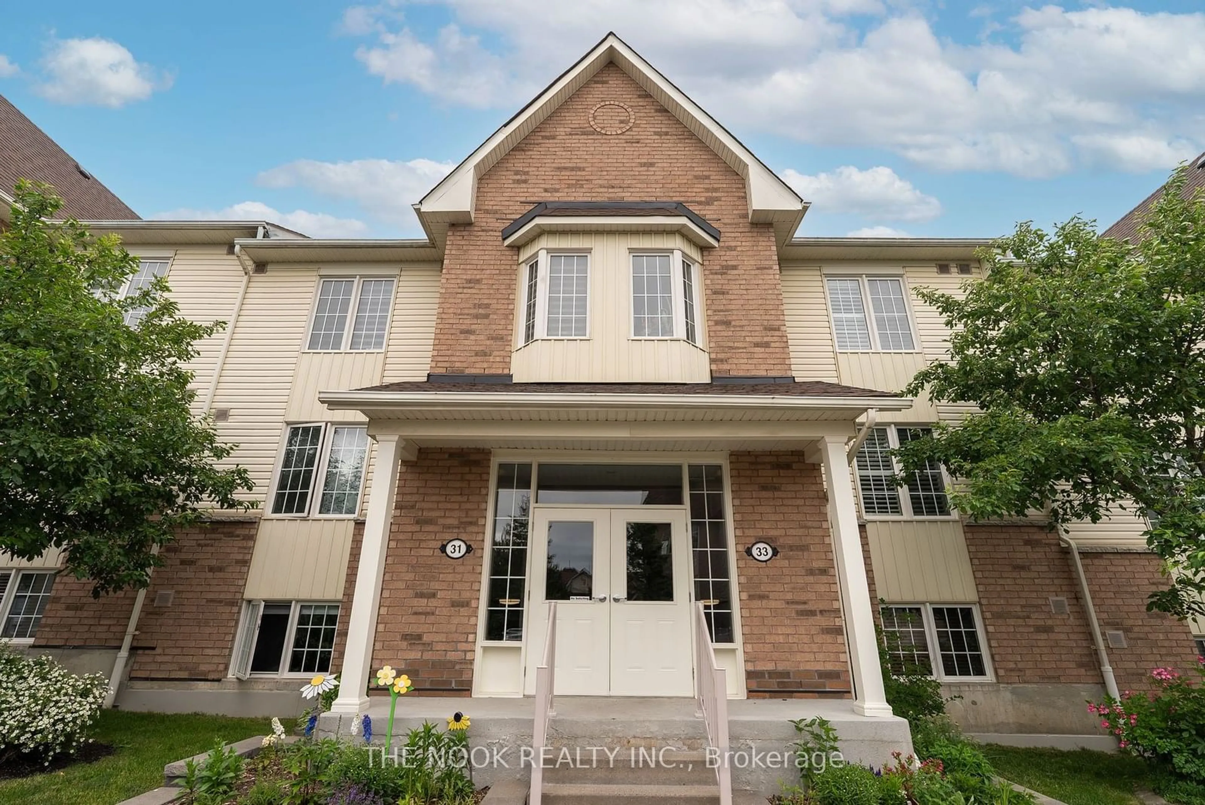 Home with brick exterior material for 33 Petra Way #2, Whitby Ontario L1R 0A7