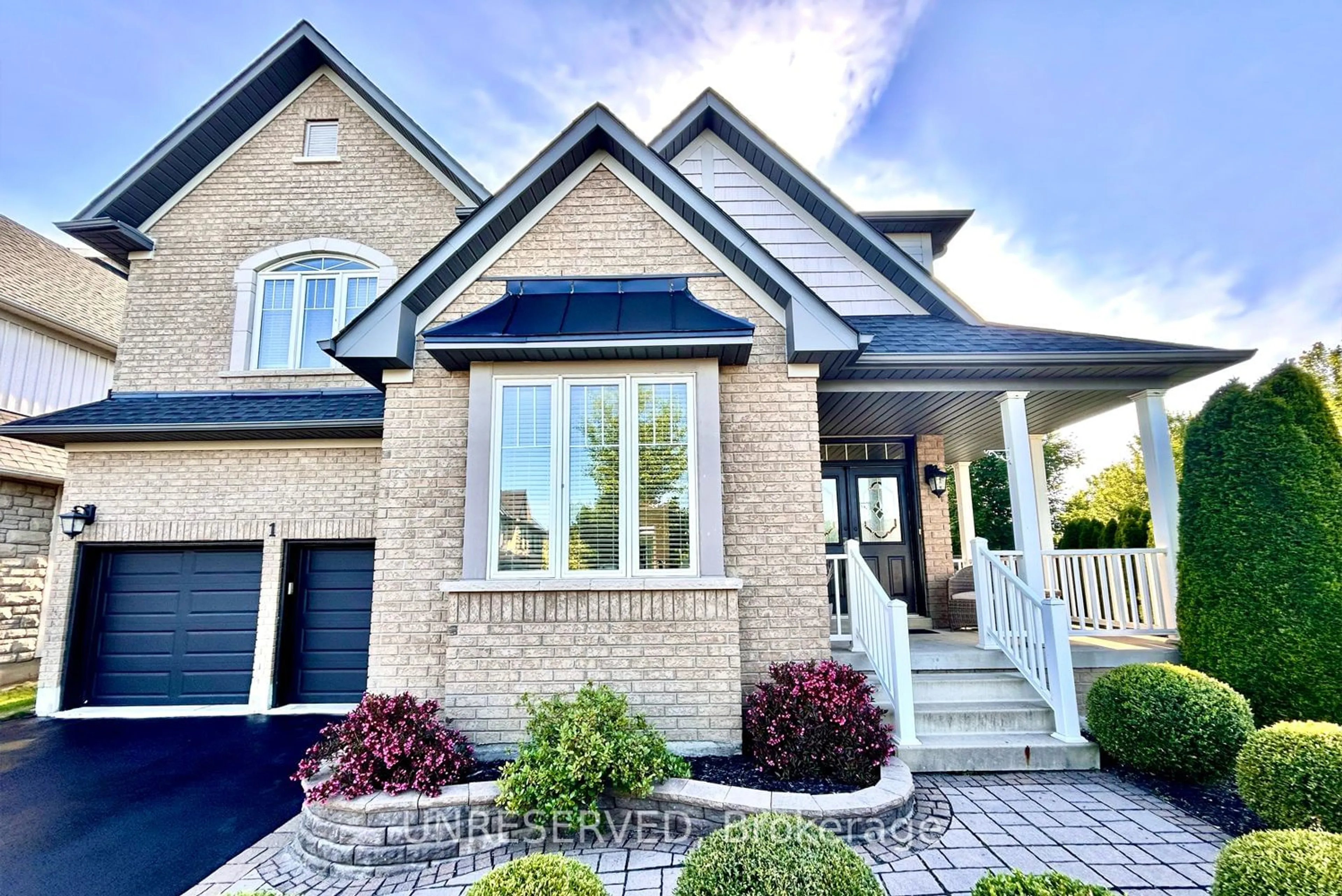 Home with brick exterior material for 1 Archstone St, Whitby Ontario L1R 3E3