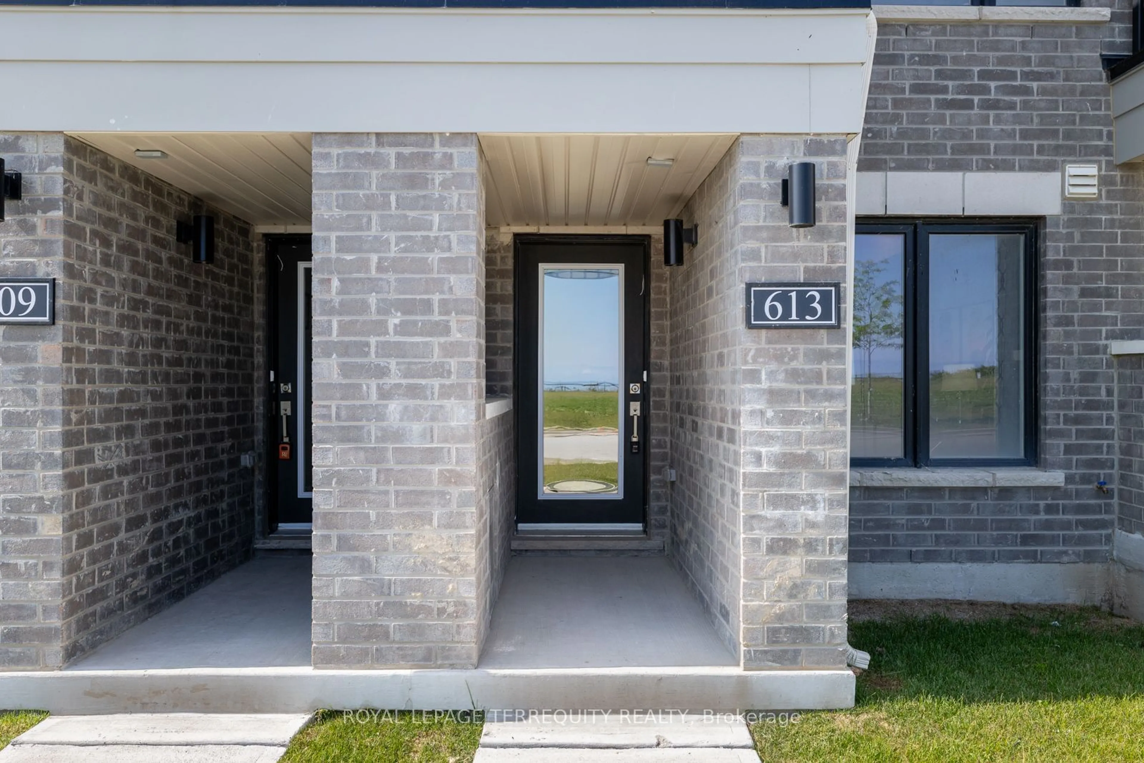 Home with brick exterior material for 613 Port Darlington Rd, Clarington Ontario L1C 3K5