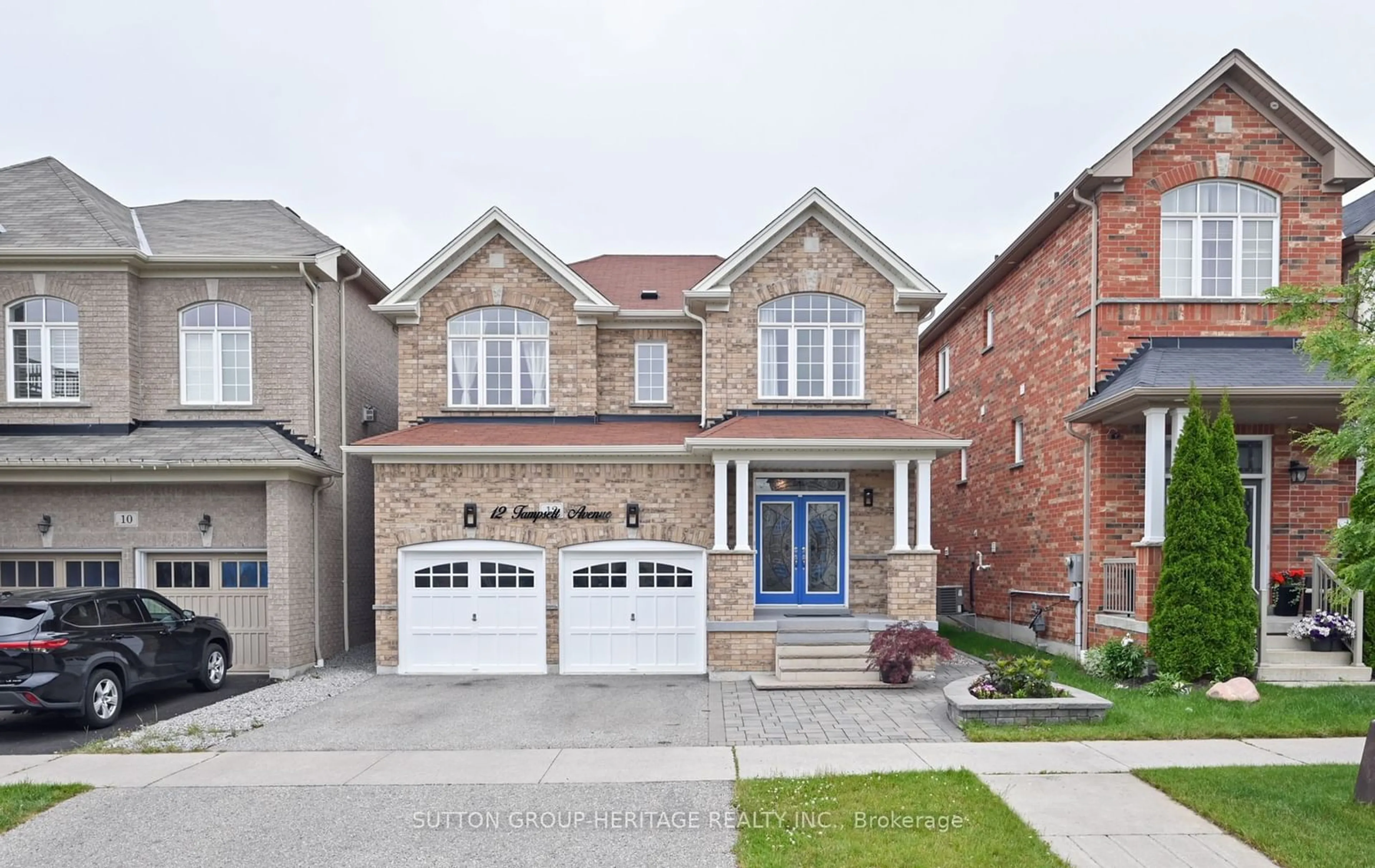 Home with brick exterior material for 12 Tampsett Ave, Ajax Ontario L1Z 0P9