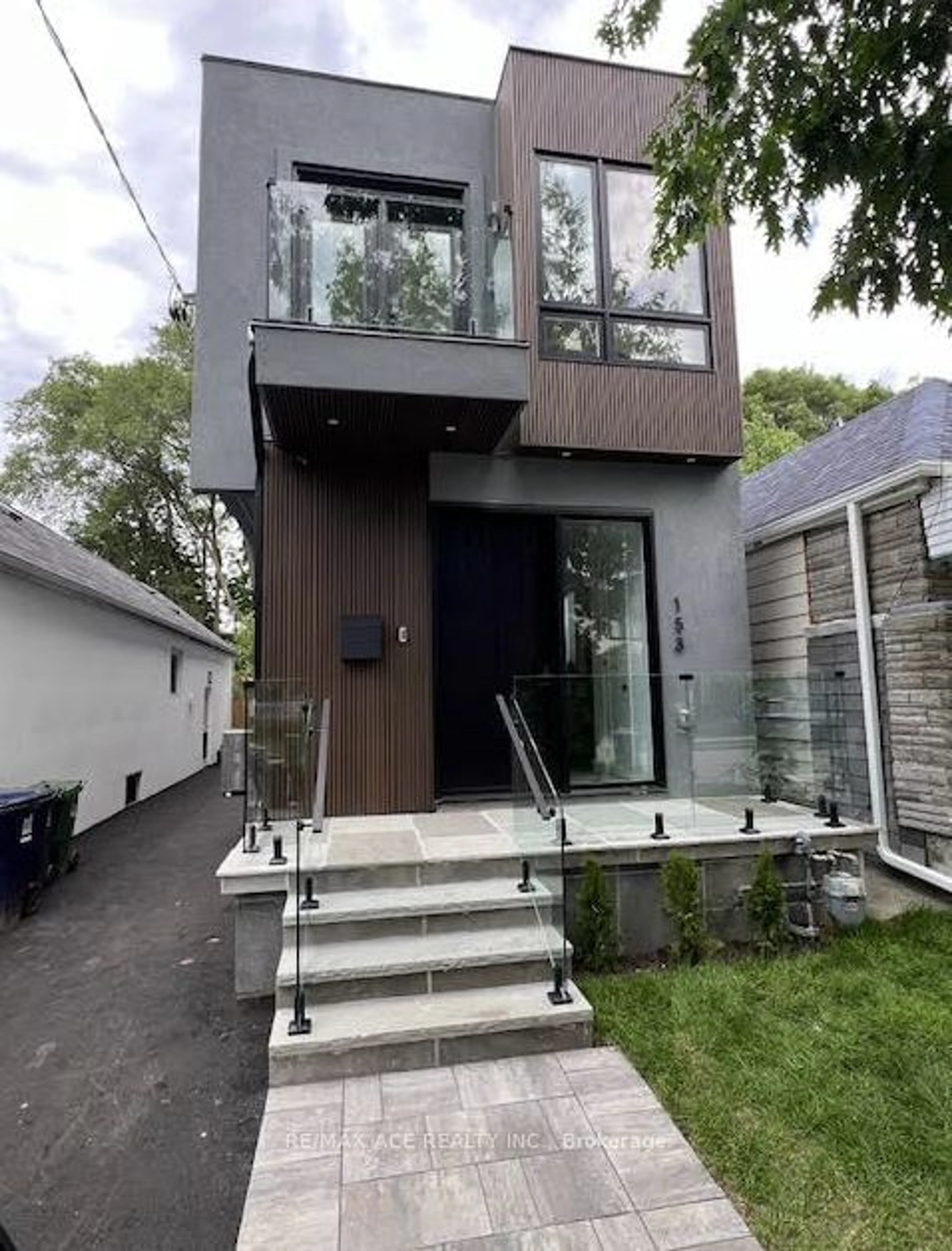 Frontside or backside of a home for 153 King Edward Ave, Toronto Ontario M4C 5J7