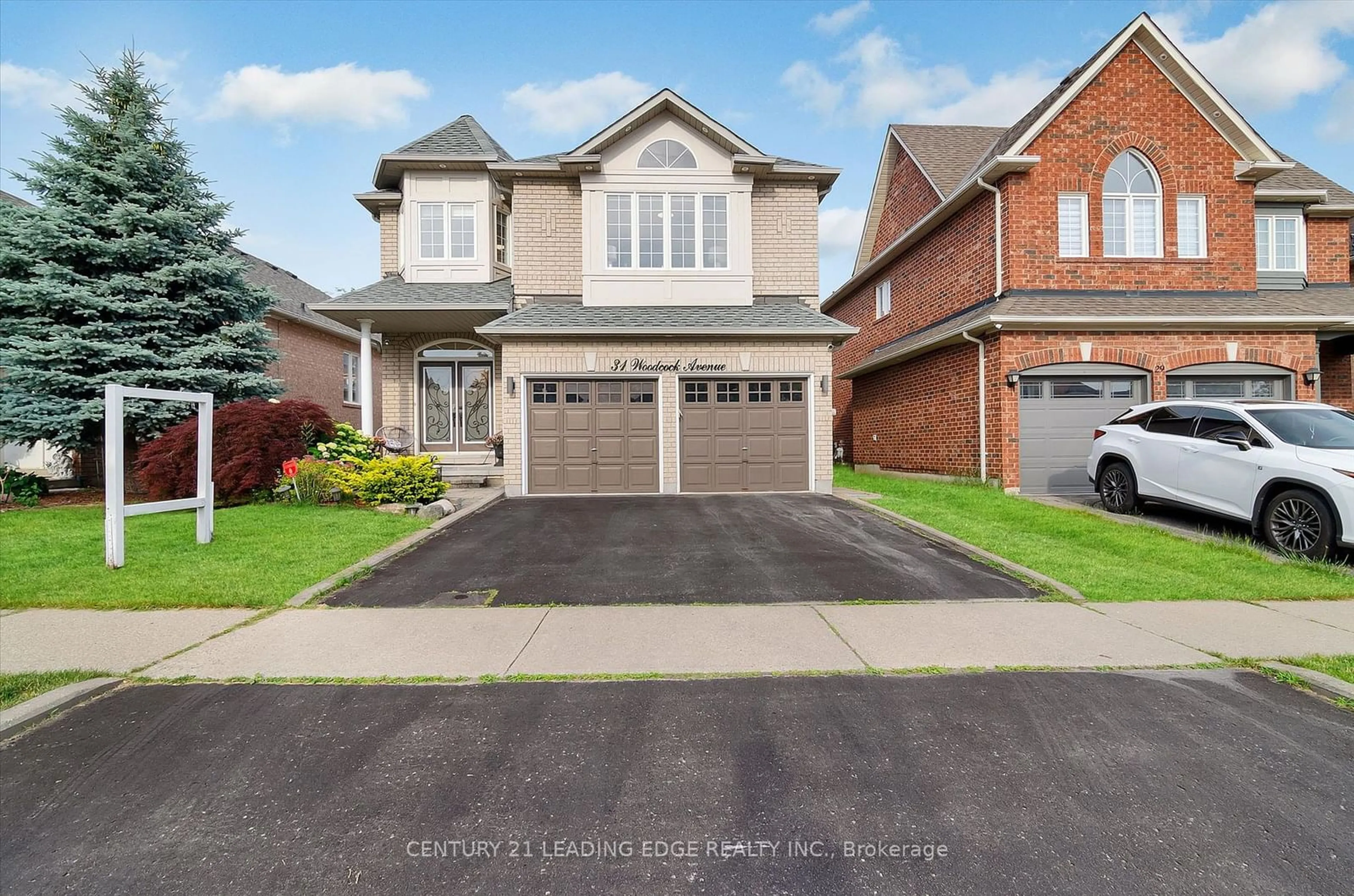 Frontside or backside of a home for 31 Woodcock Ave, Ajax Ontario L1T 4J5