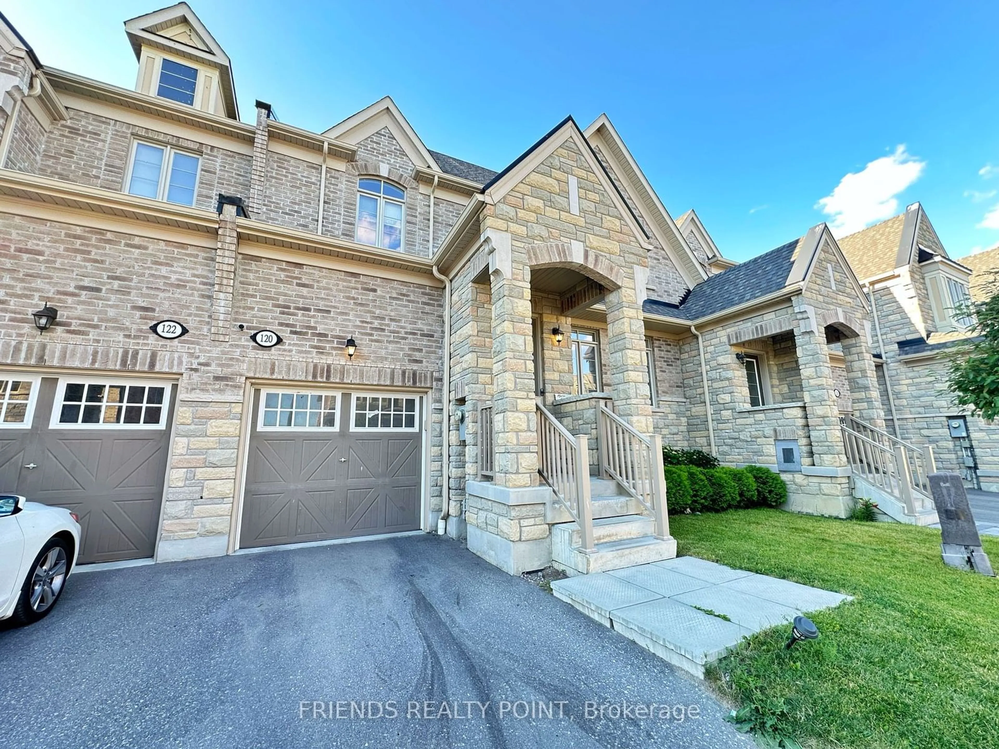 Home with brick exterior material for 120 Masterson Lane, Ajax Ontario L1T 0N6