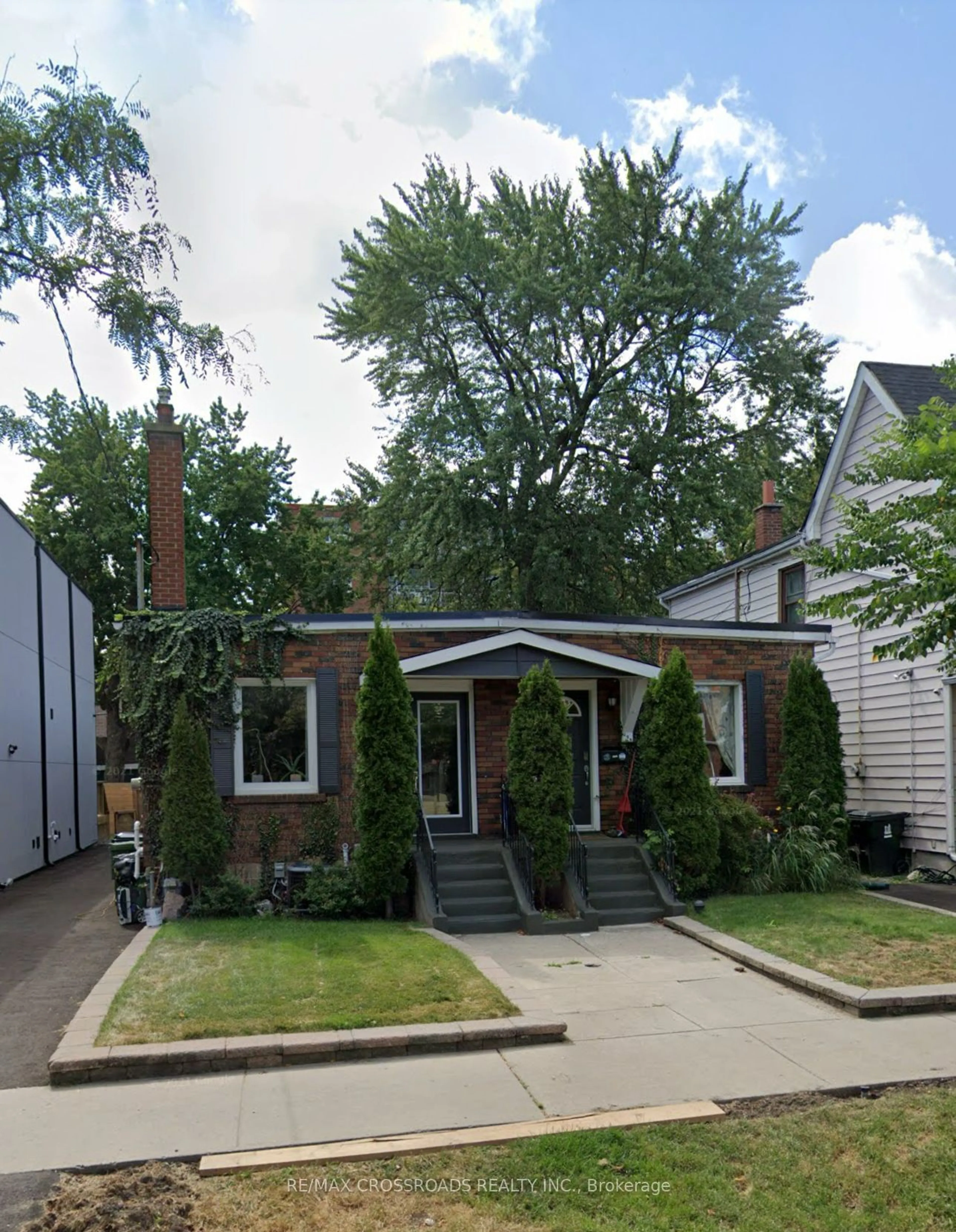 Frontside or backside of a home for 261 Gamble Ave, Toronto Ontario M4J 2P4