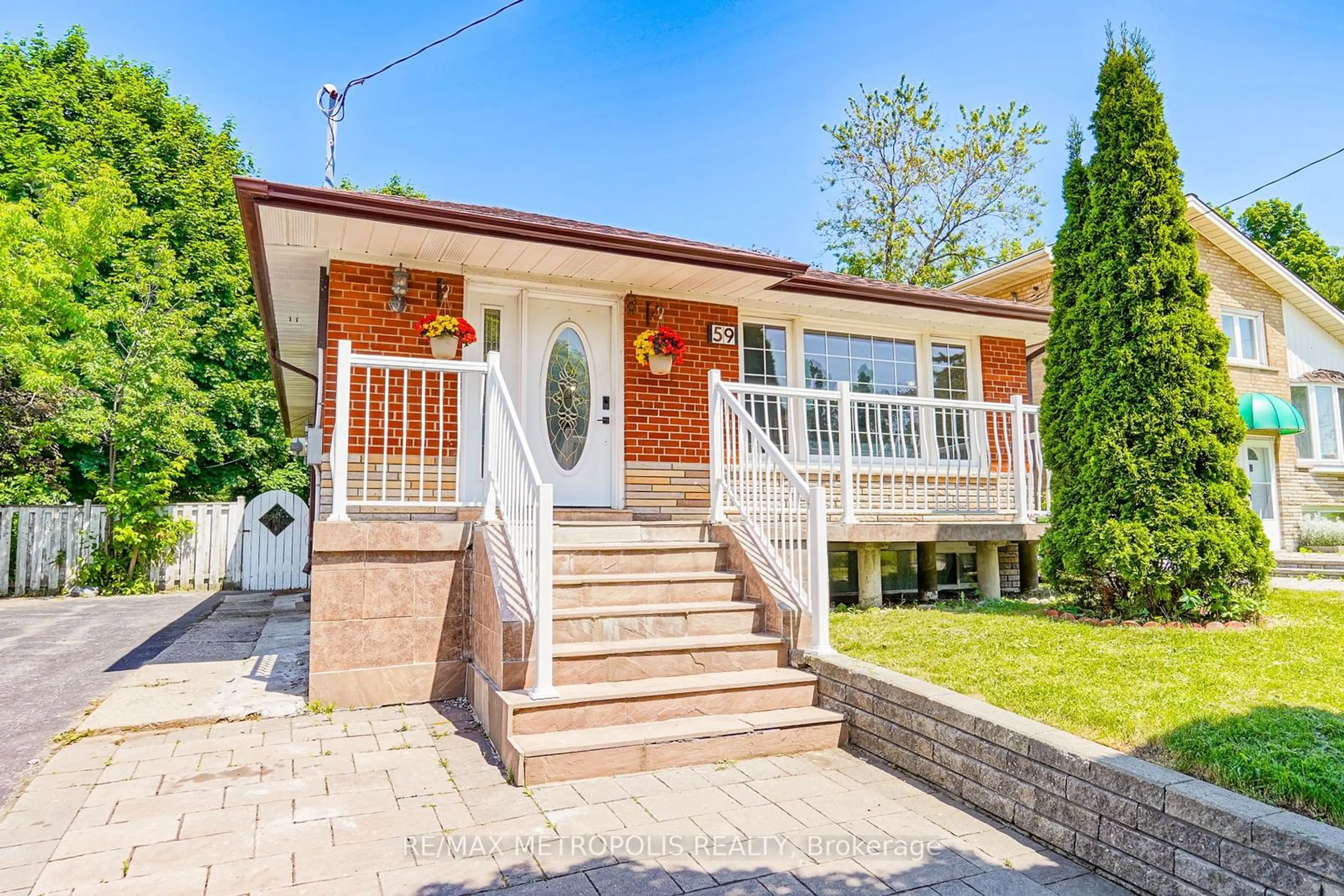 Home with brick exterior material for 59 Grassington Cres, Toronto Ontario M1G 1X4