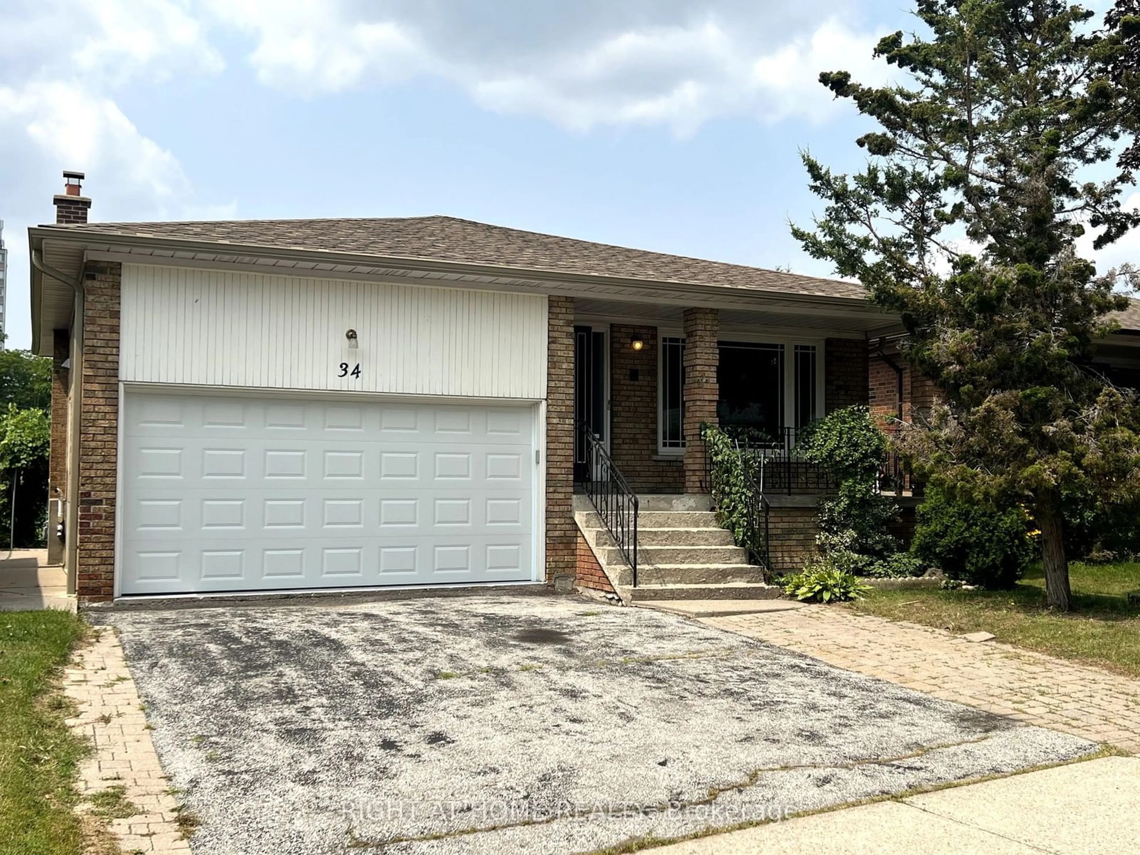 Frontside or backside of a home for 34 Beamsville Dr, Toronto Ontario M1T 3S2