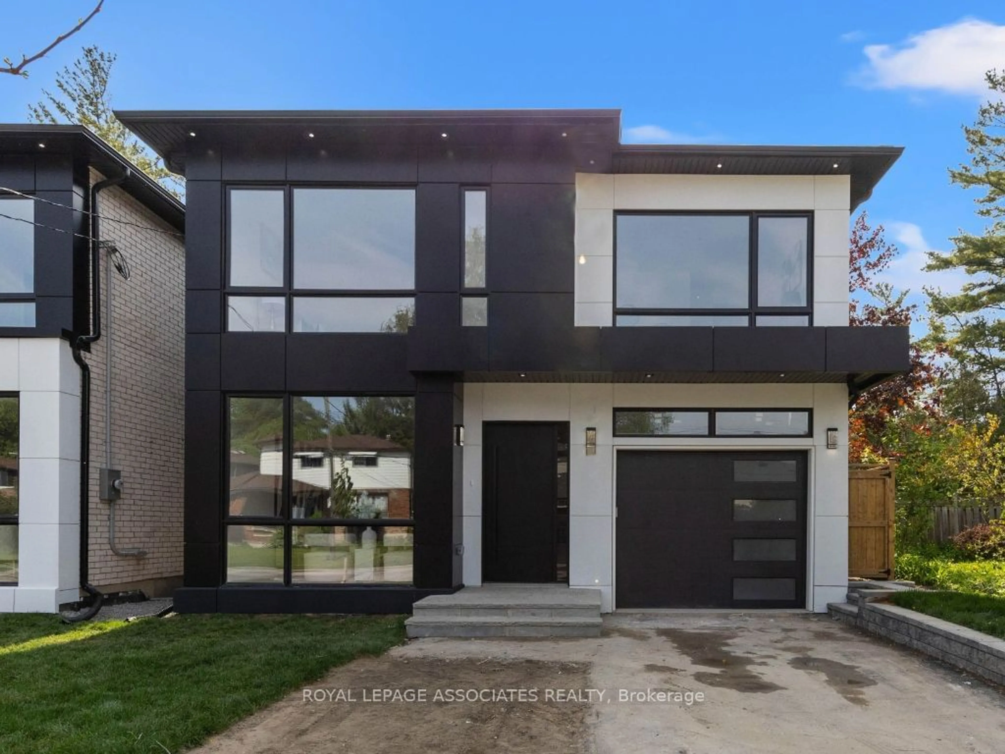 Frontside or backside of a home for 98 Bobmar Rd, Toronto Ontario M1C 1C9