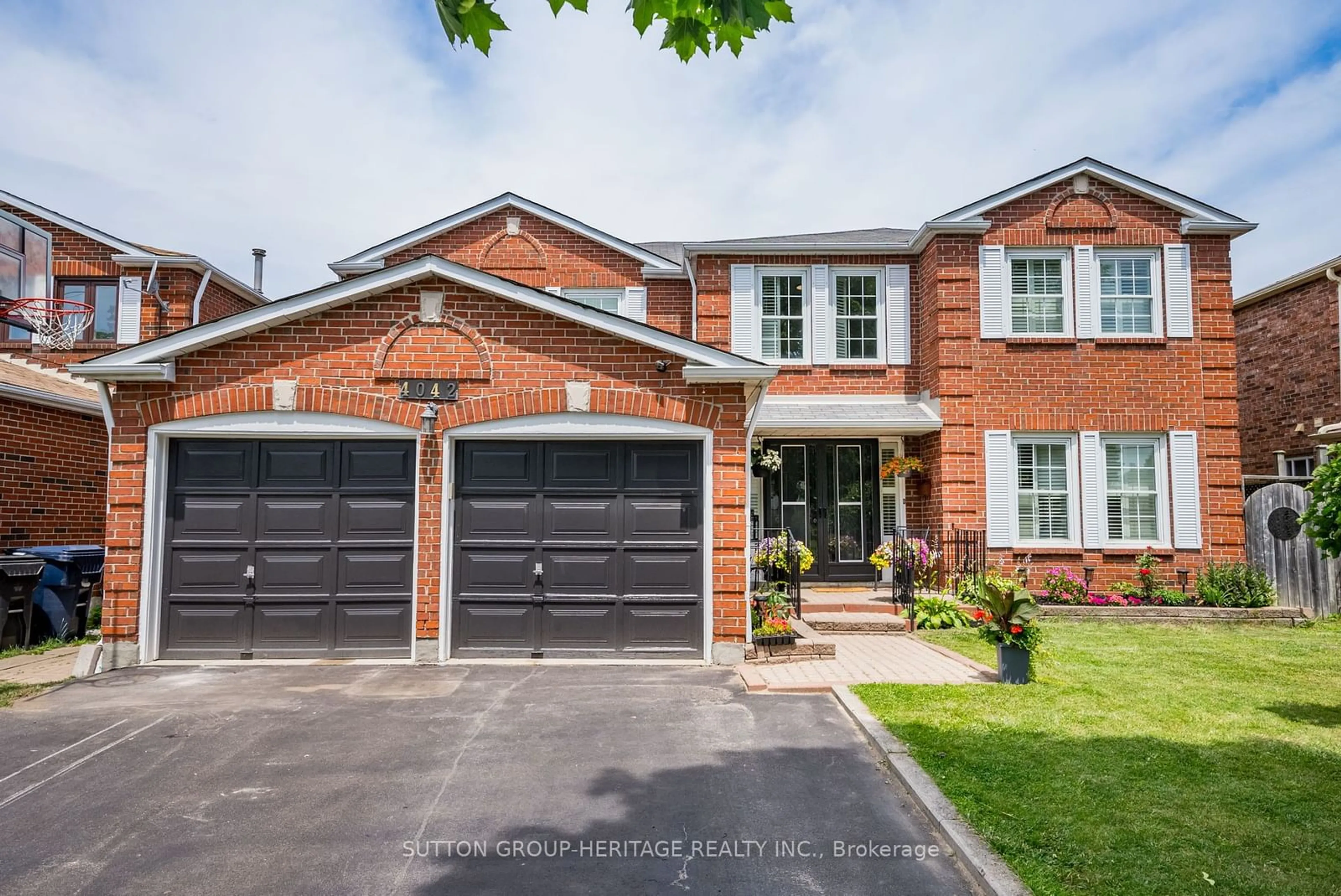 Home with brick exterior material for 4042 Ellesmere Rd, Toronto Ontario M1C 1H7
