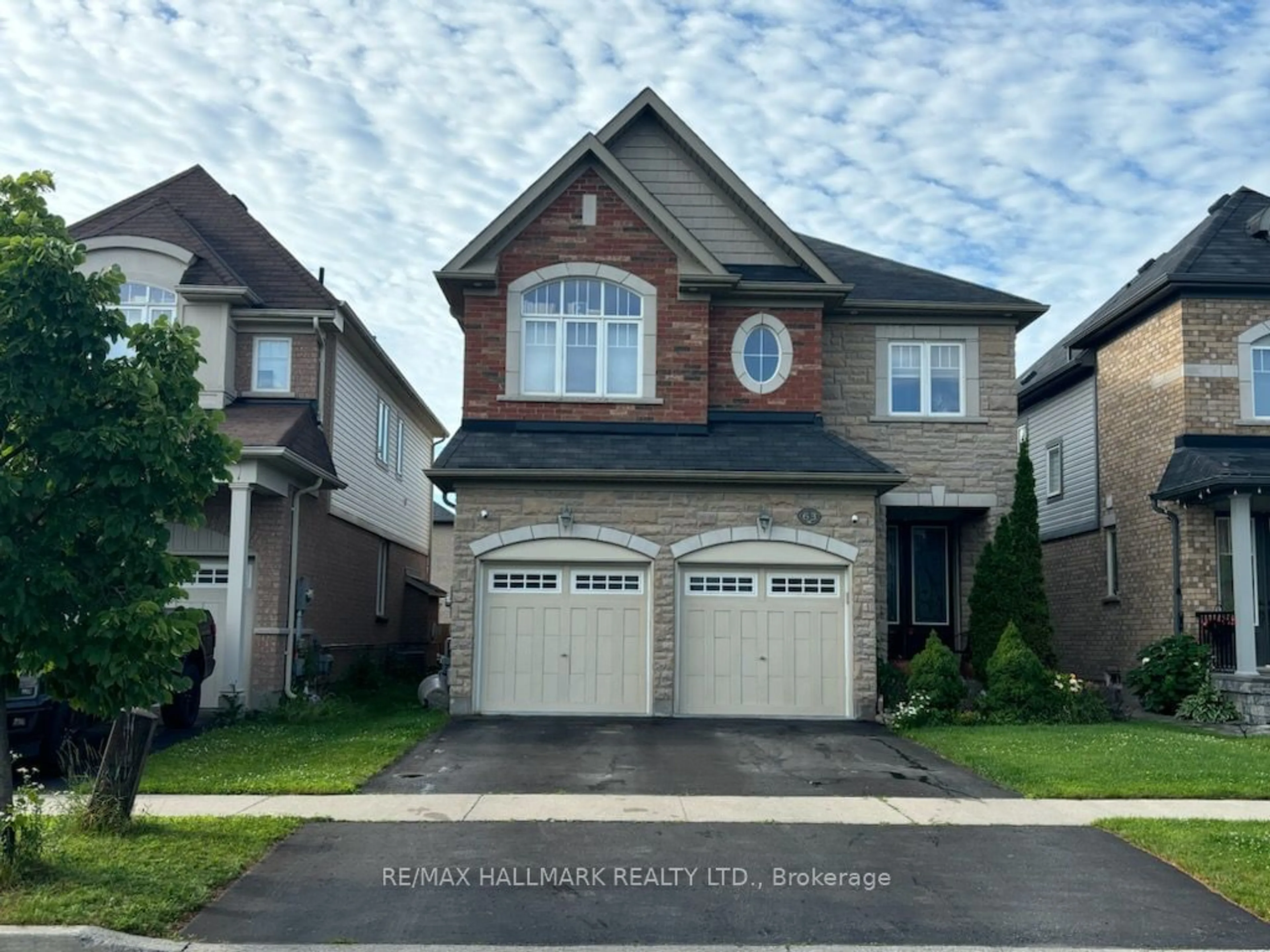 Frontside or backside of a home for 63 Buxton Lane, Clarington Ontario L1C 0J5