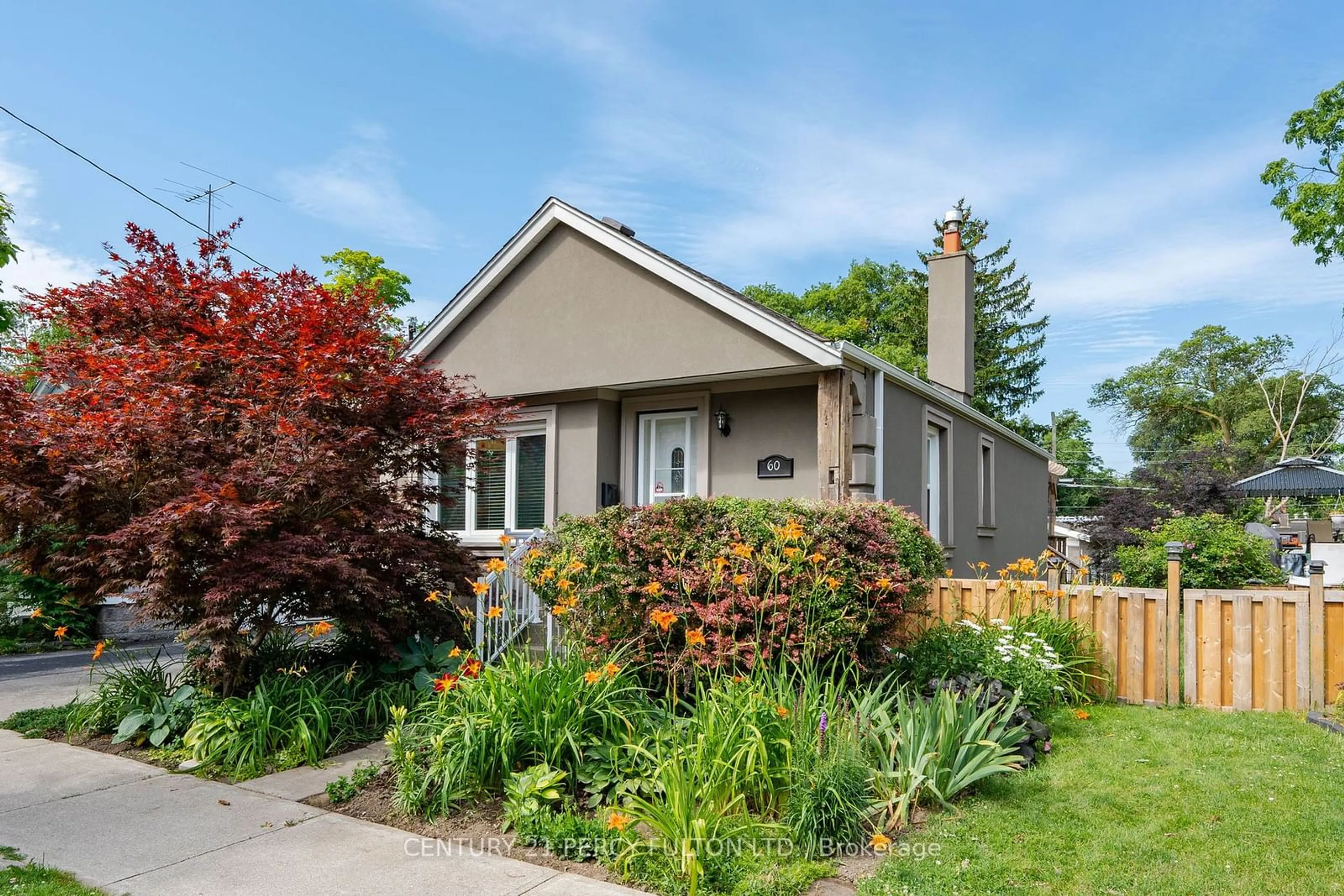 Frontside or backside of a home for 60 Bertha Ave, Toronto Ontario M1L 3M2