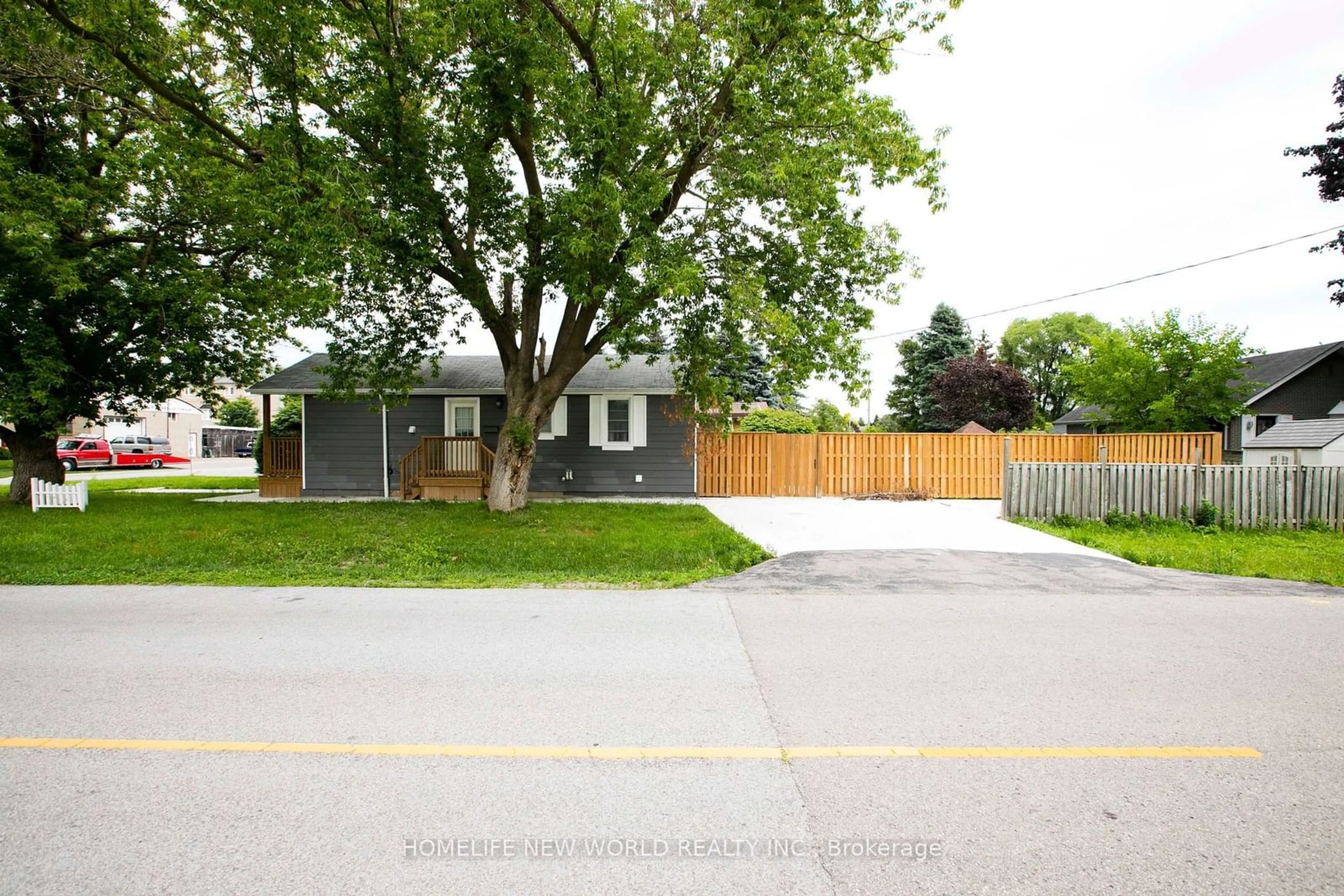 Frontside or backside of a home, the fenced backyard for 111 Palmerston Ave, Whitby Ontario L1N 3E6