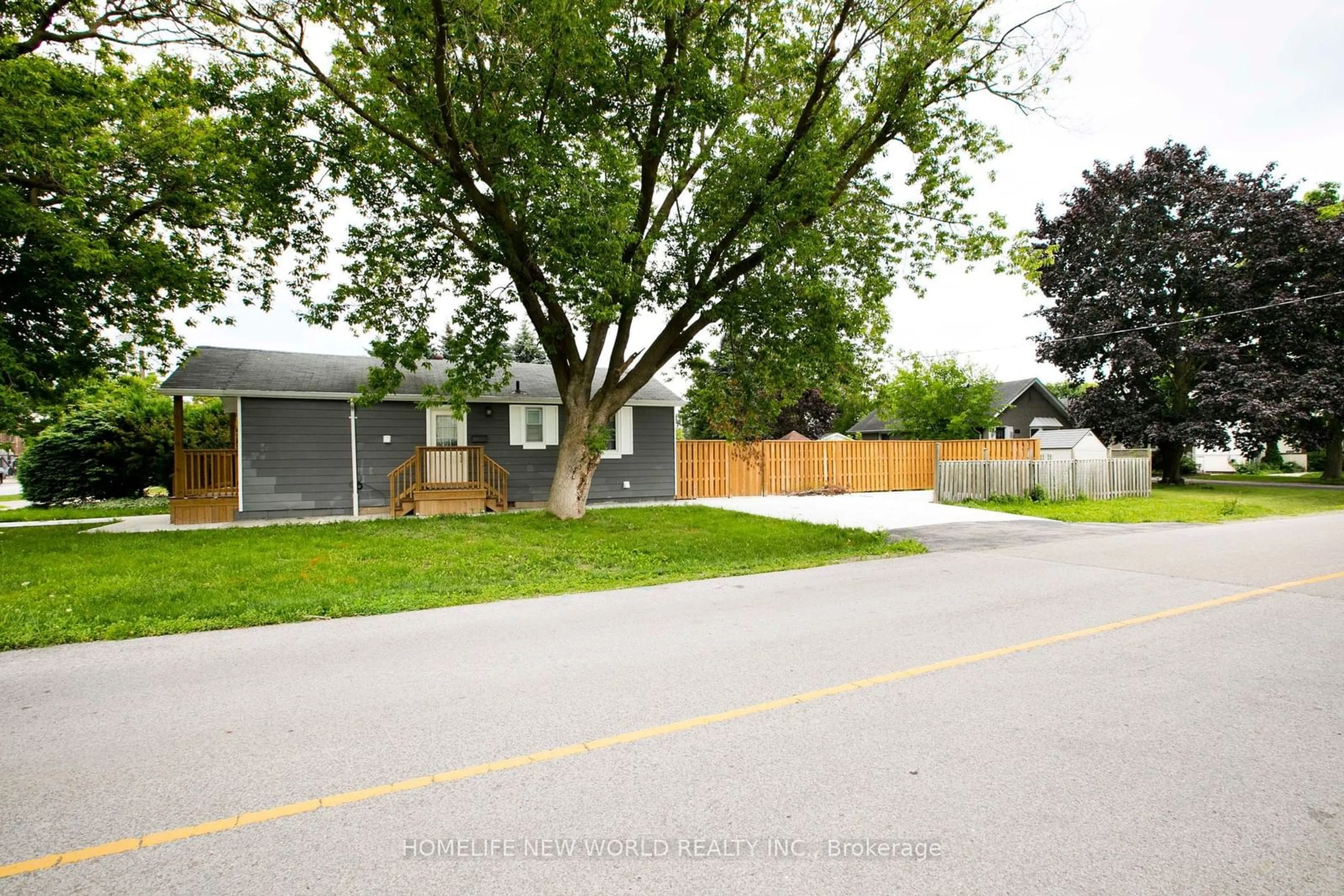 Frontside or backside of a home, the fenced backyard for 111 Palmerston Ave, Whitby Ontario L1N 3E6