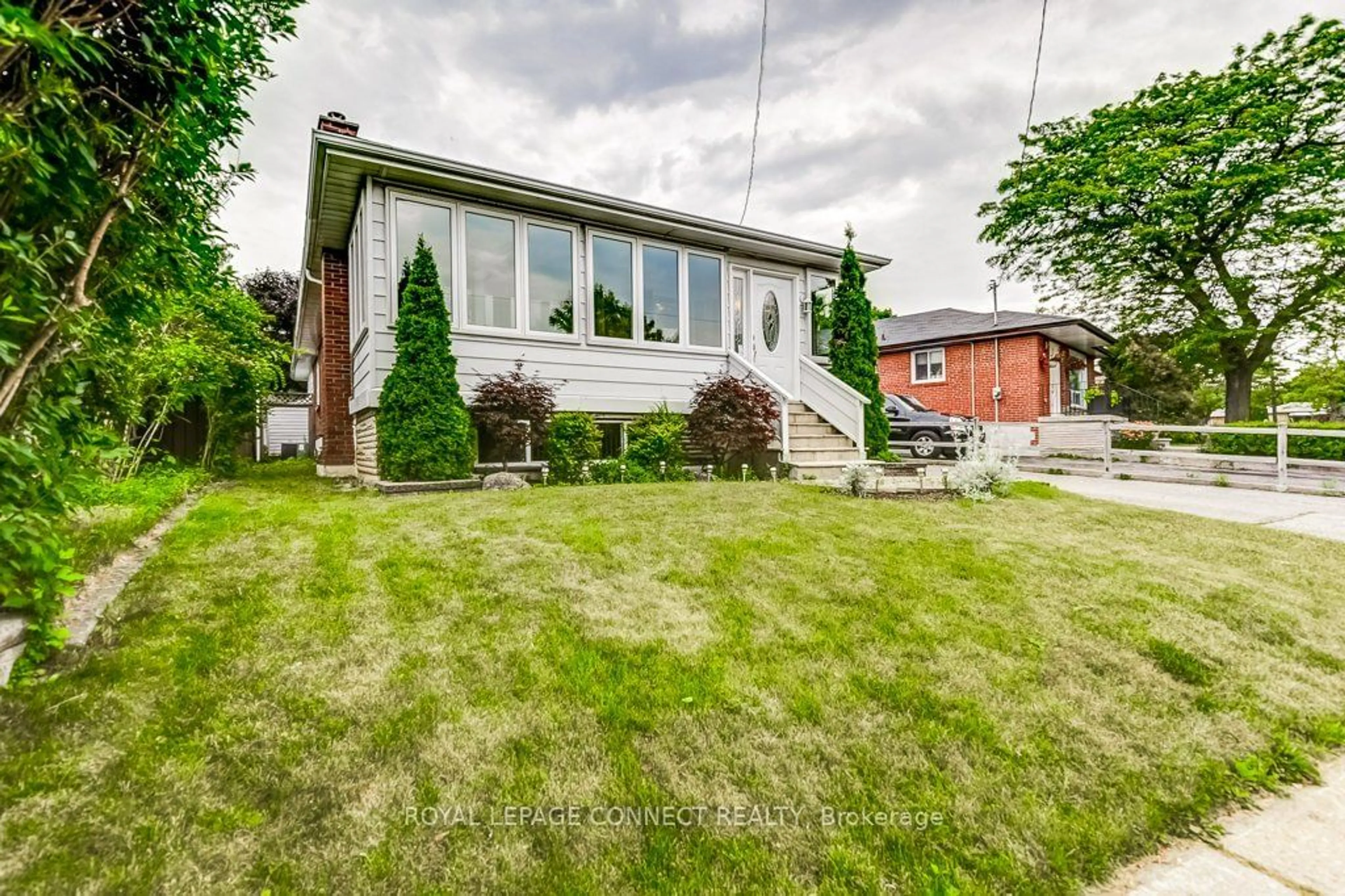 Frontside or backside of a home for 793 Brimorton Dr, Toronto Ontario M1G 2S8