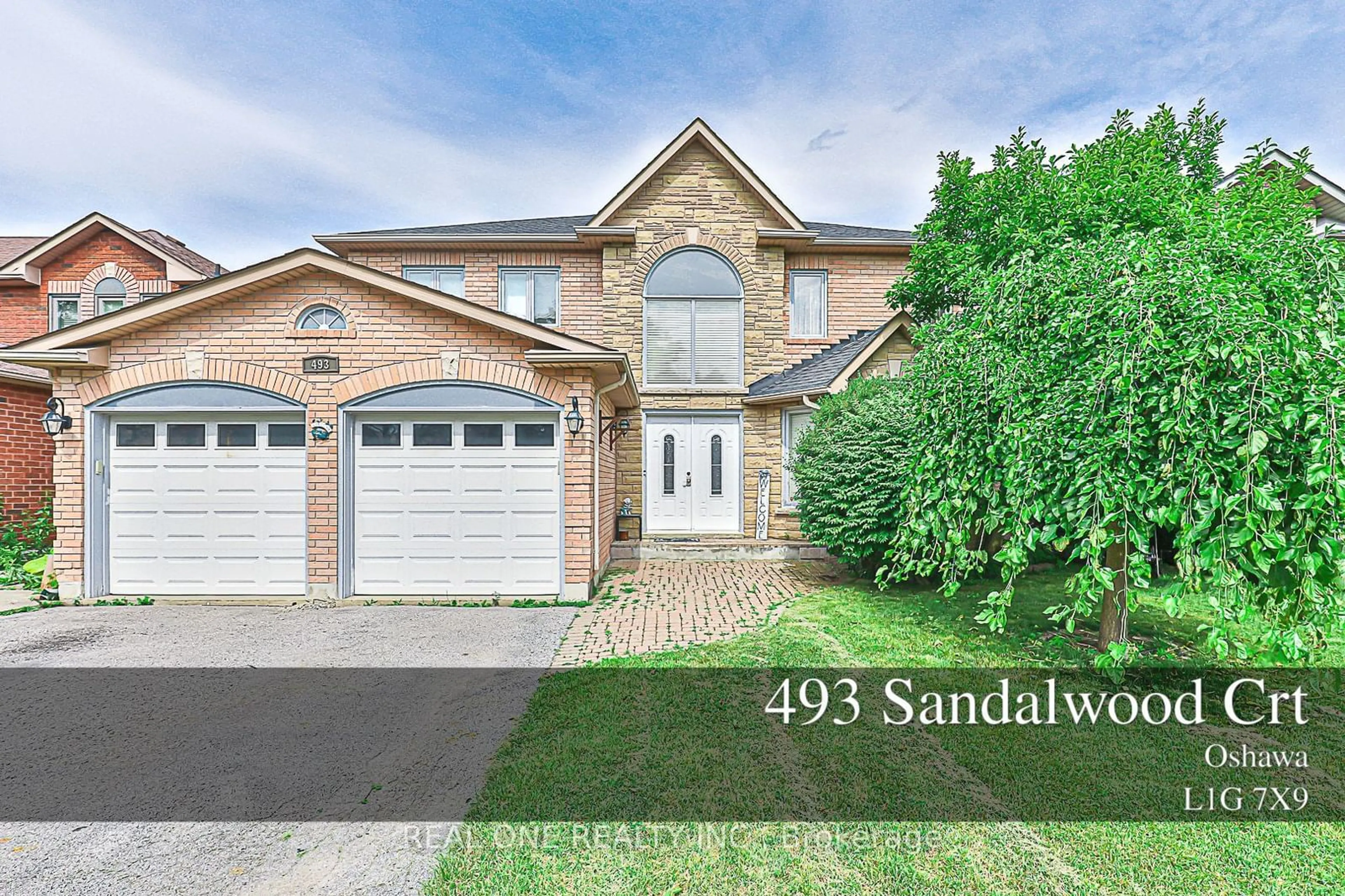Frontside or backside of a home for 493 sandalwood Crt, Oshawa Ontario L1G 7X9