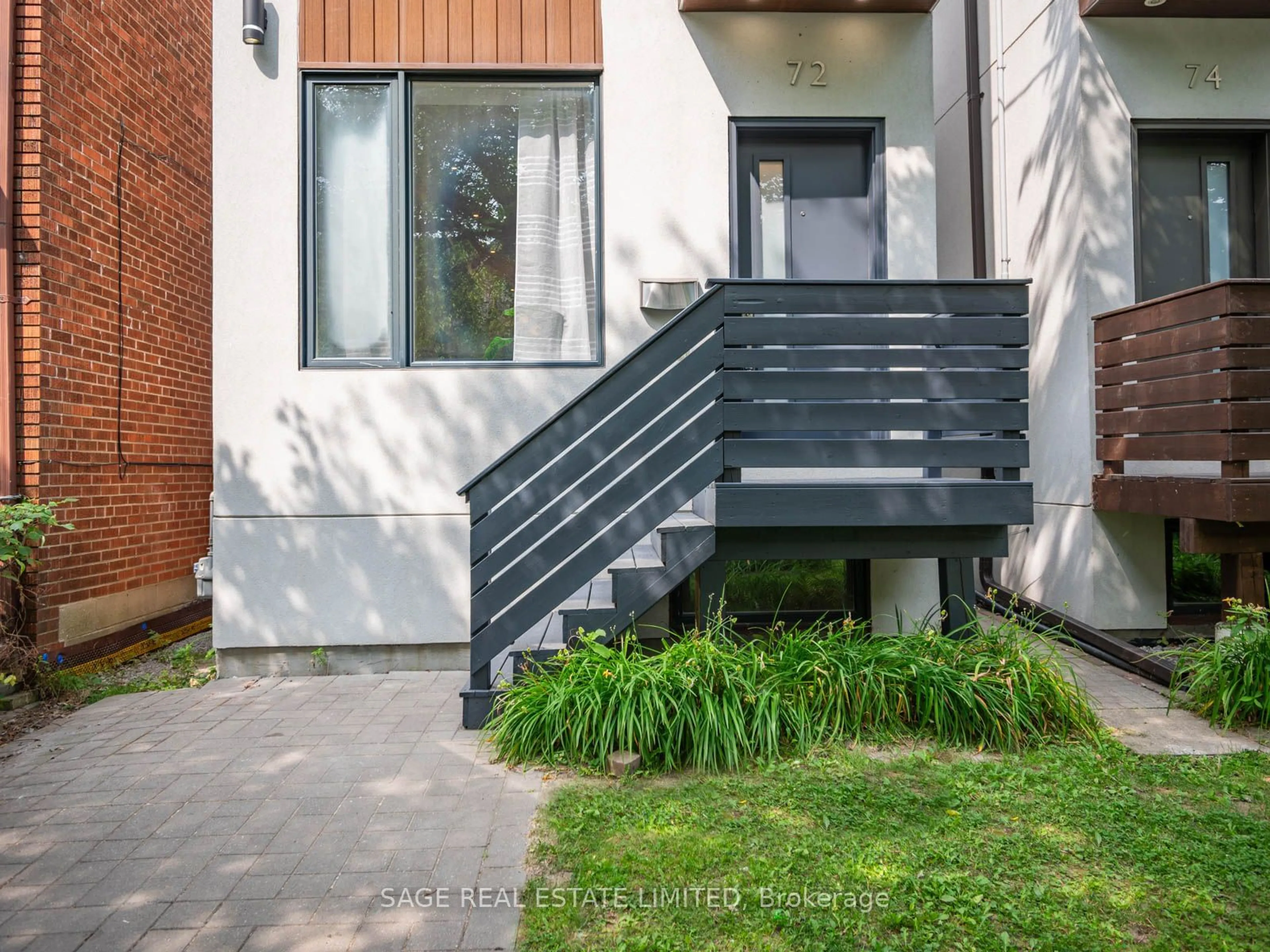 Home with brick exterior material for 72 Curzon St, Toronto Ontario M4M 3B4
