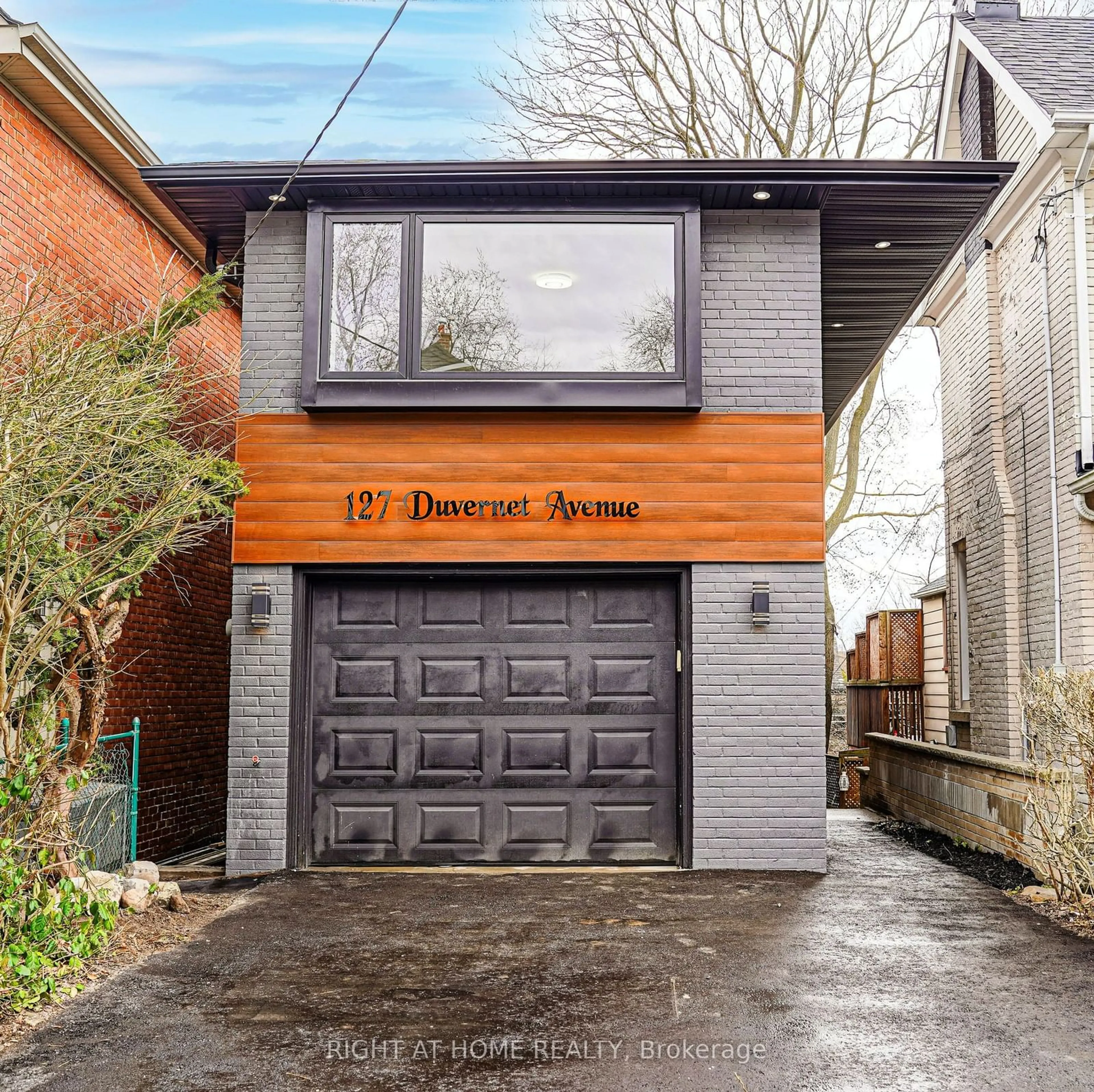 Home with brick exterior material for 127 Duvernet Ave, Toronto Ontario M4E 1V5