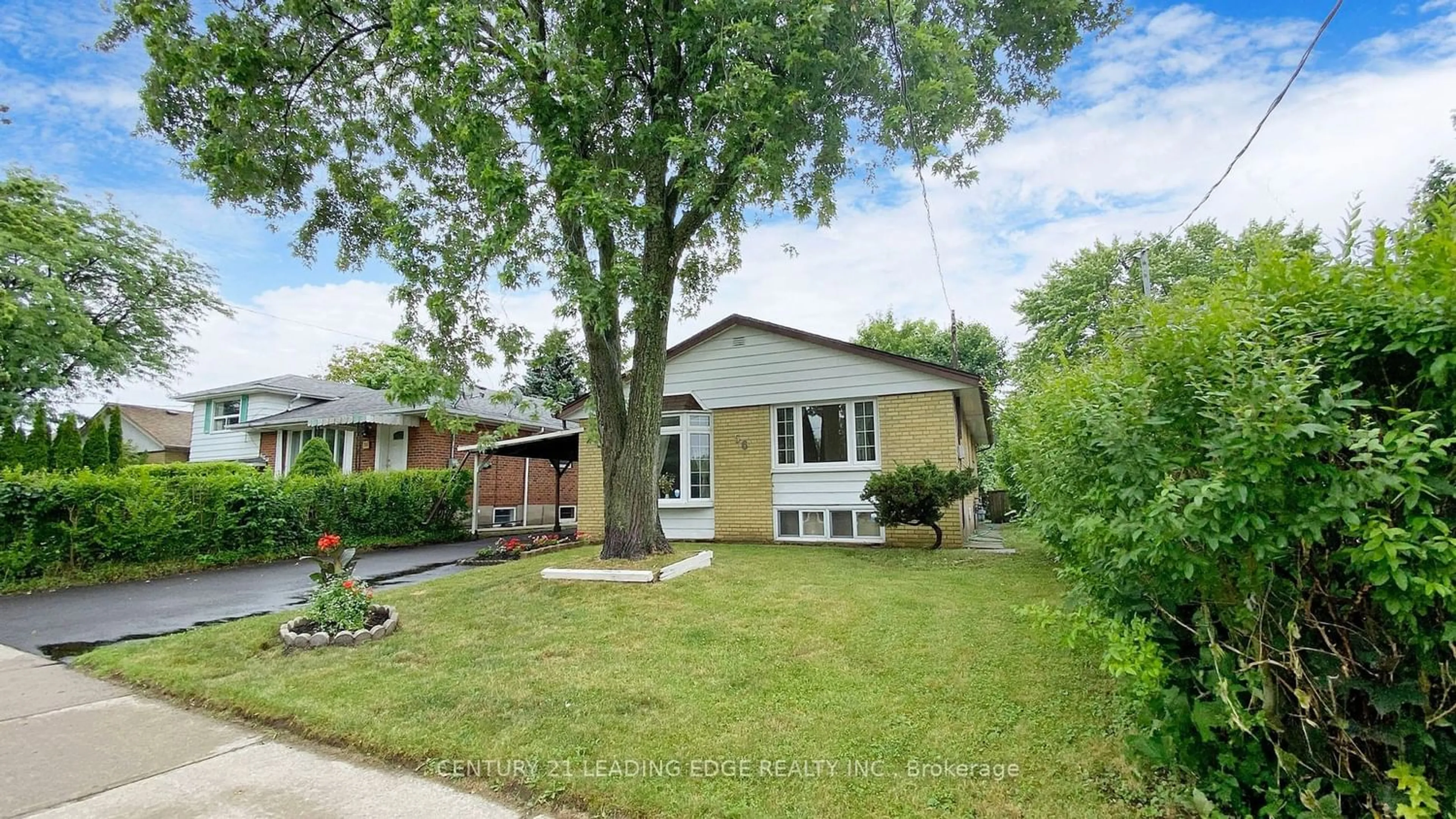 Frontside or backside of a home for 56 Carslake Cres, Toronto Ontario M1J 2A7