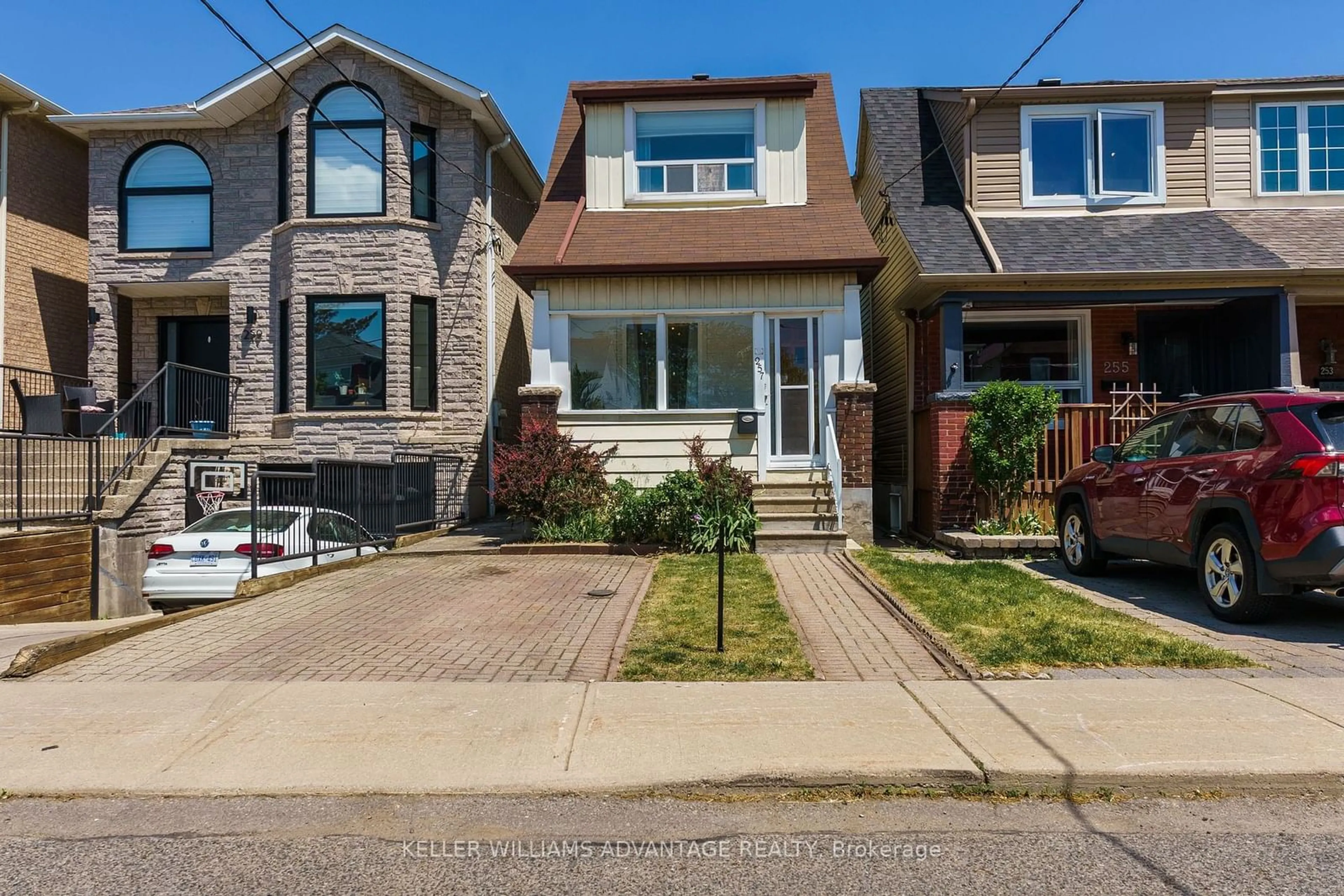 Frontside or backside of a home for 257 Linsmore Cres, Toronto Ontario M4J 4L6