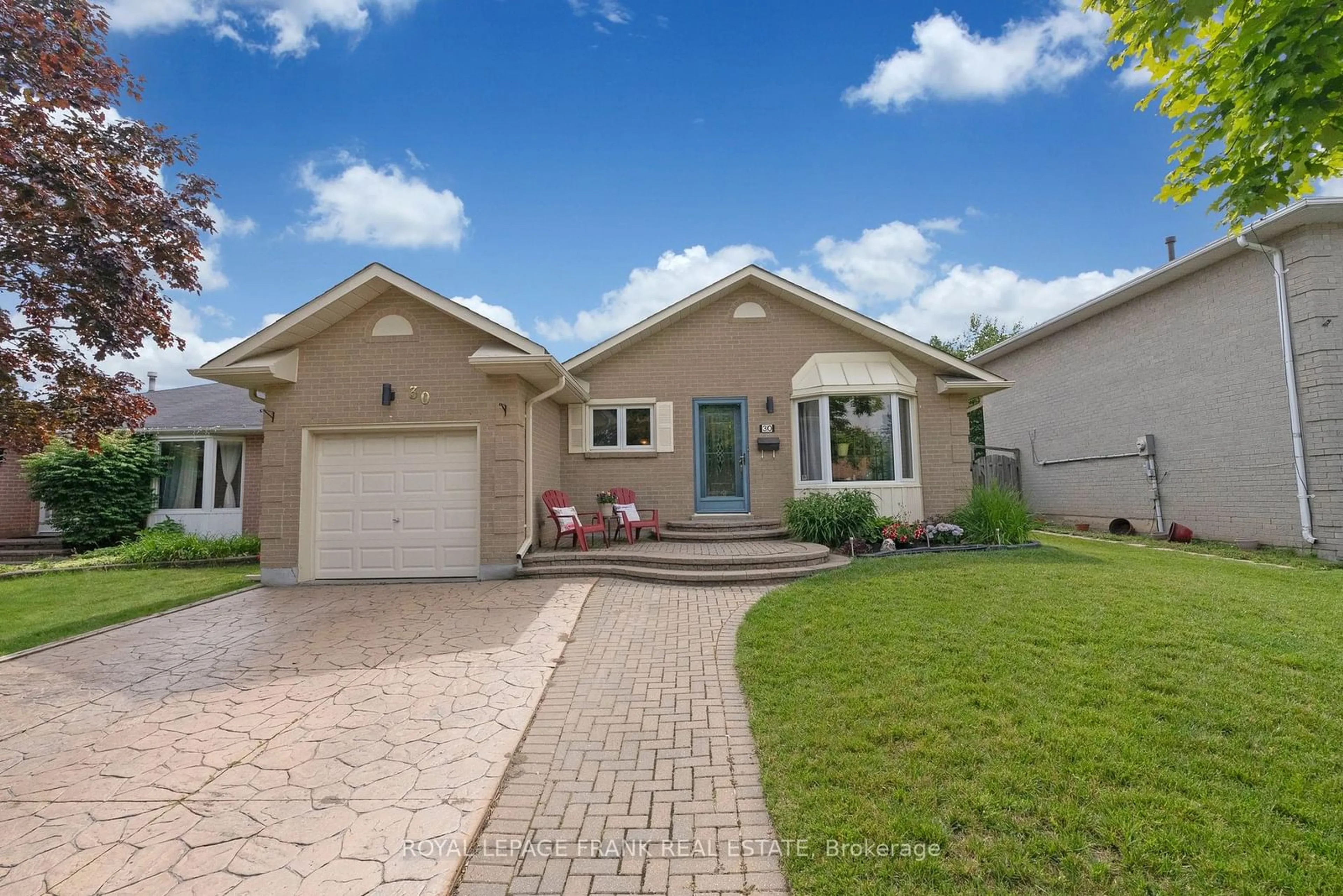 Frontside or backside of a home for 30 Centerfield Dr, Clarington Ontario L1E 1H4