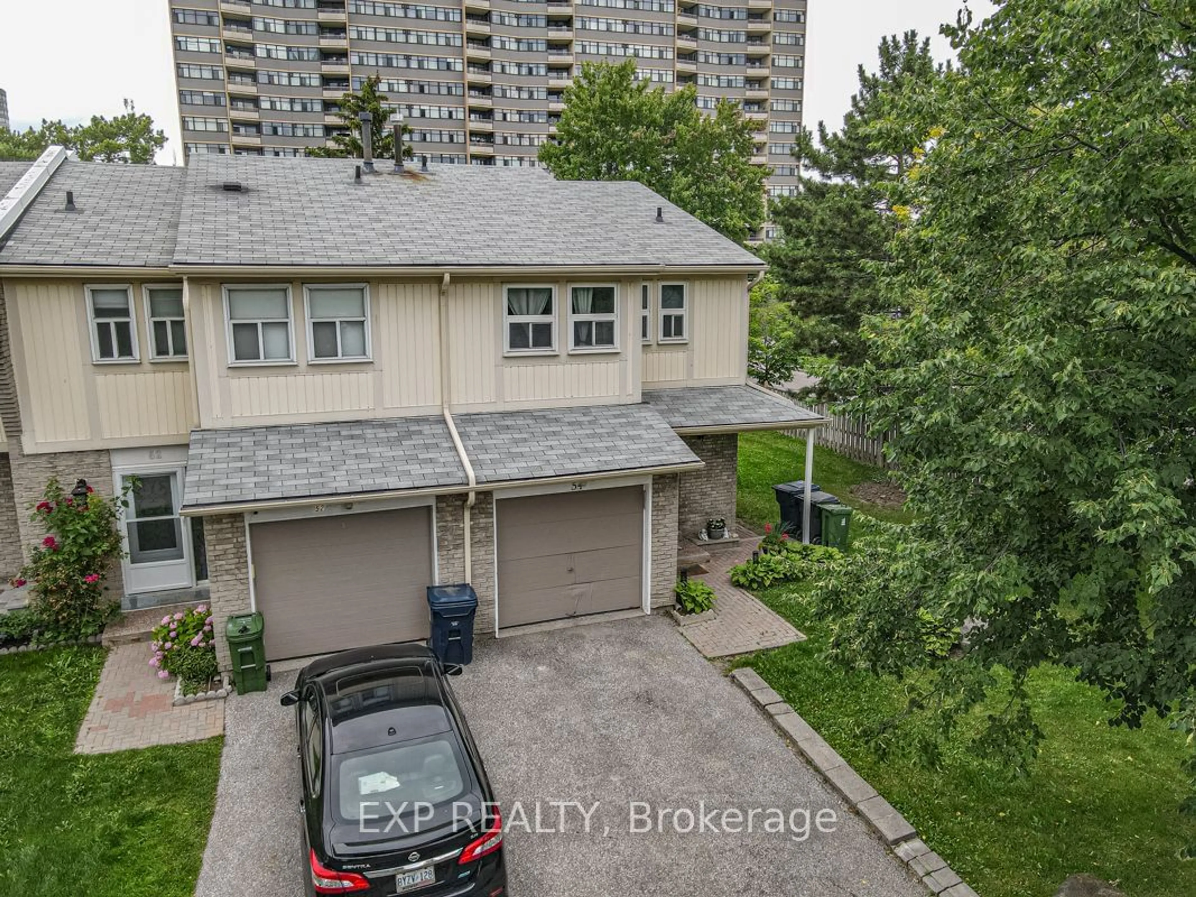 A pic from exterior of the house or condo for 1290 Bridletowne Circ #54, Toronto Ontario M1W 2V4