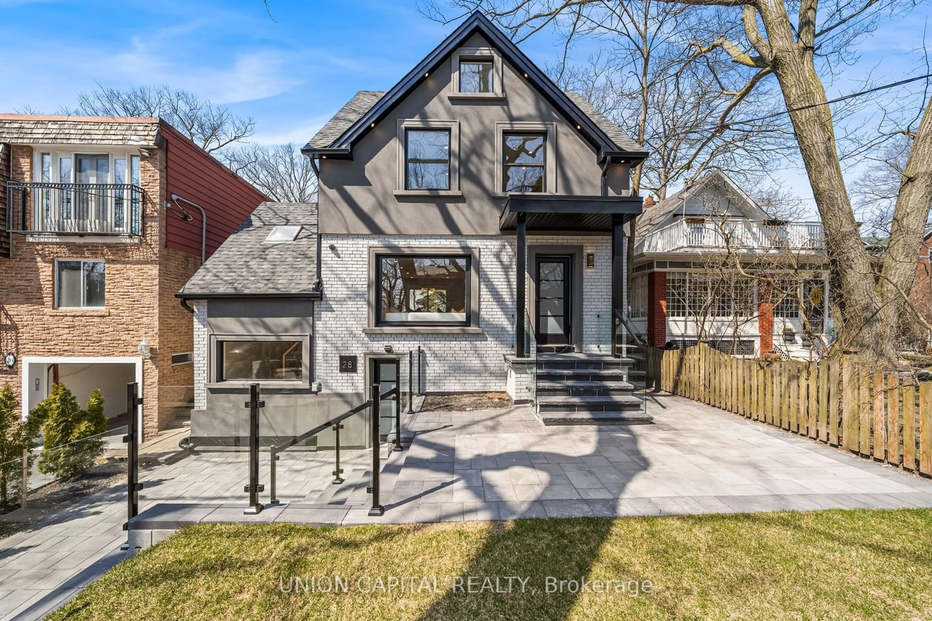 Home with brick exterior material for 28 Pine Ave, Toronto Ontario M4E 1L8